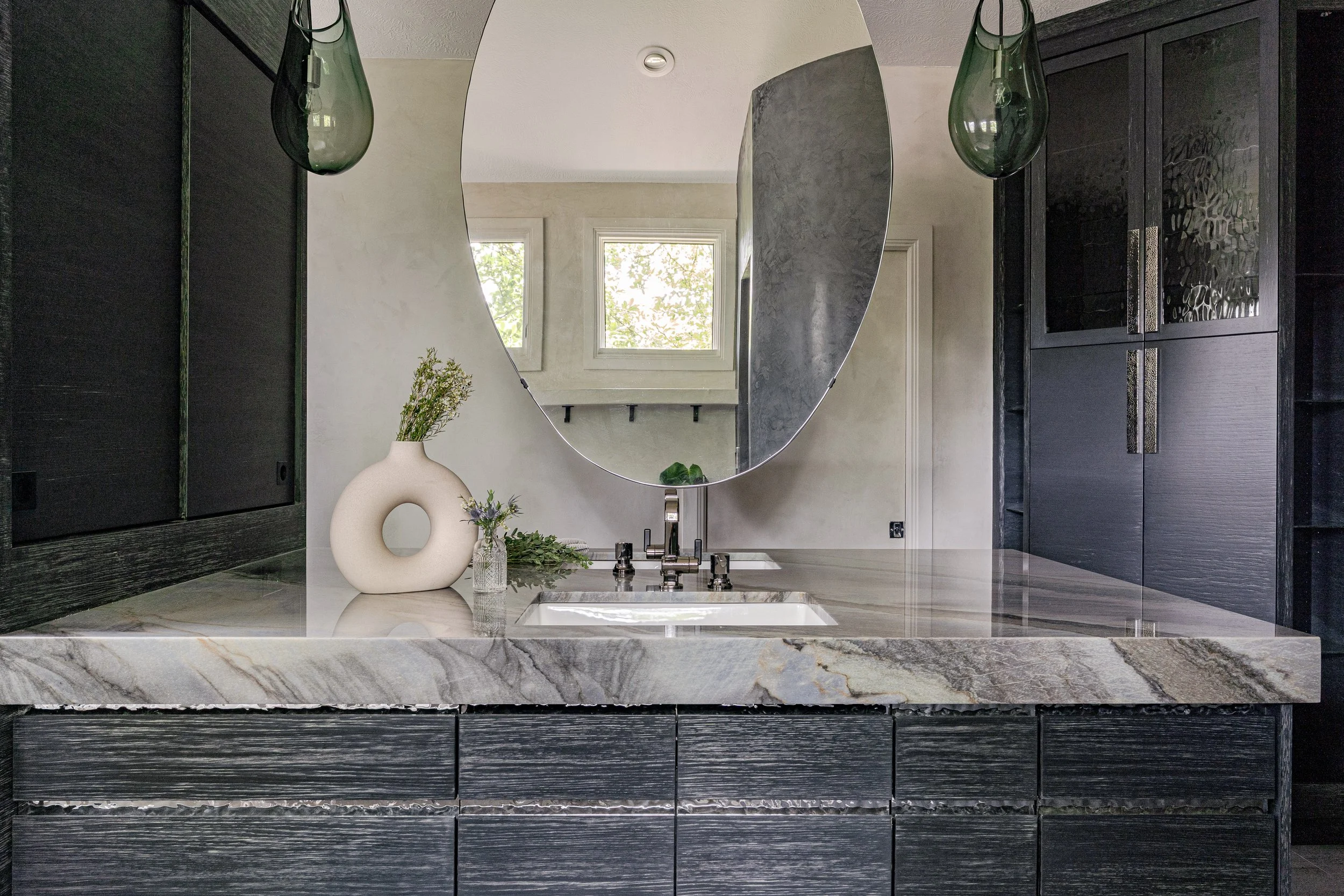 Built-in bathroom storage for towels and everyday essentials.