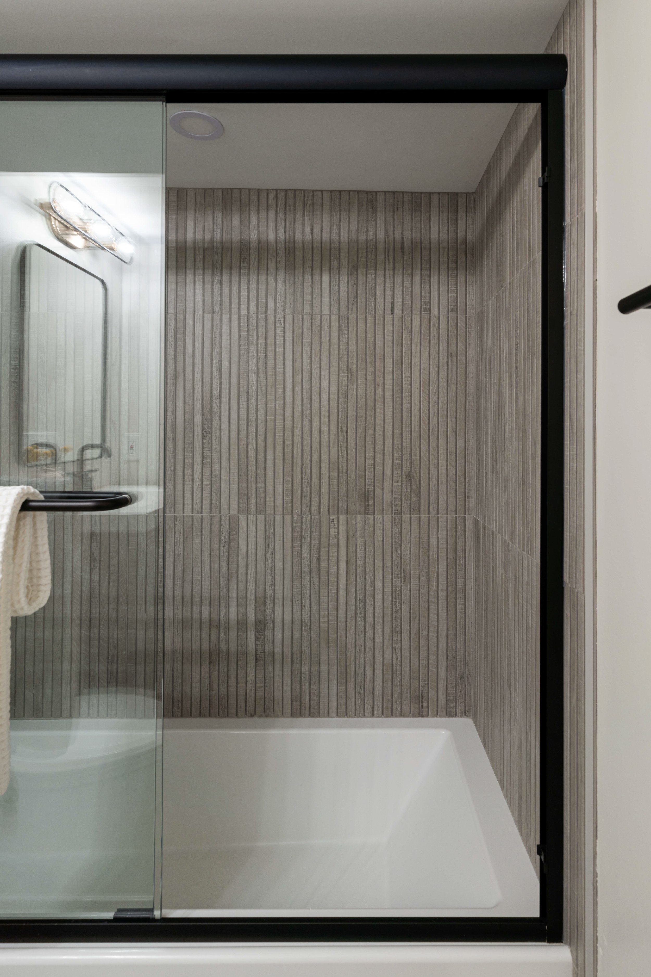 Refined Gatherings kitchen, bathroom, dining room, living room, and social spaces designed by Teela Bennett Design.