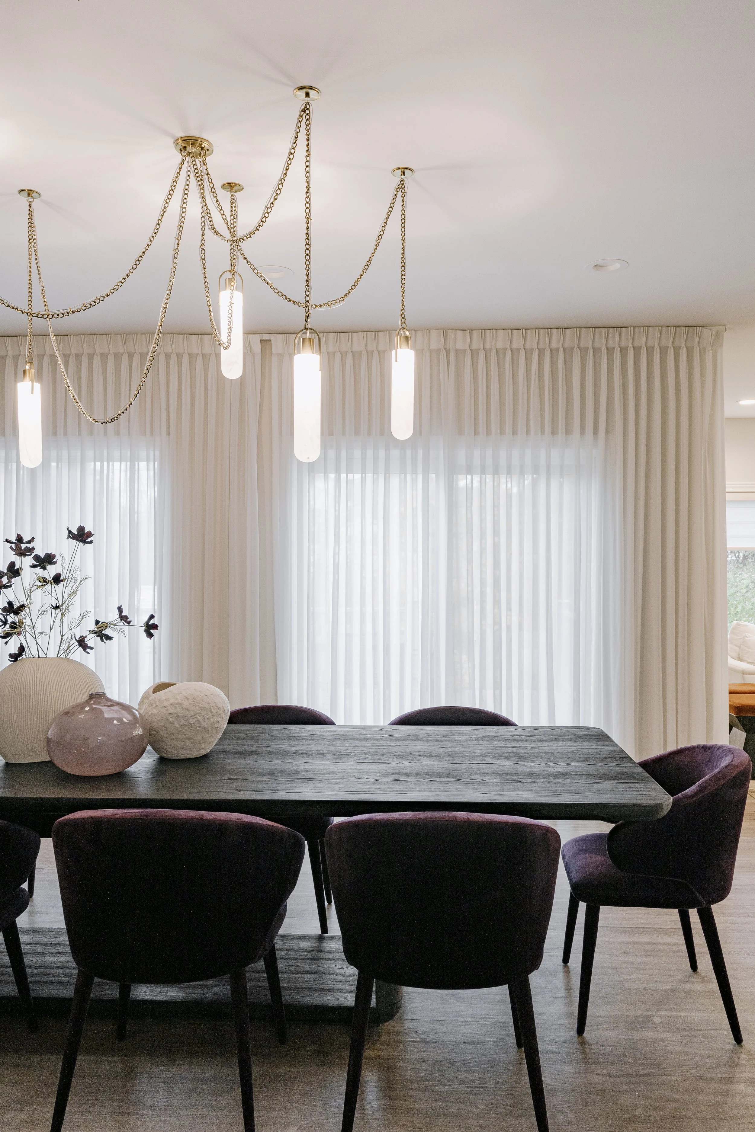 Refined Gatherings kitchen, bathroom, dining room, living room, and social spaces designed by Teela Bennett Design.