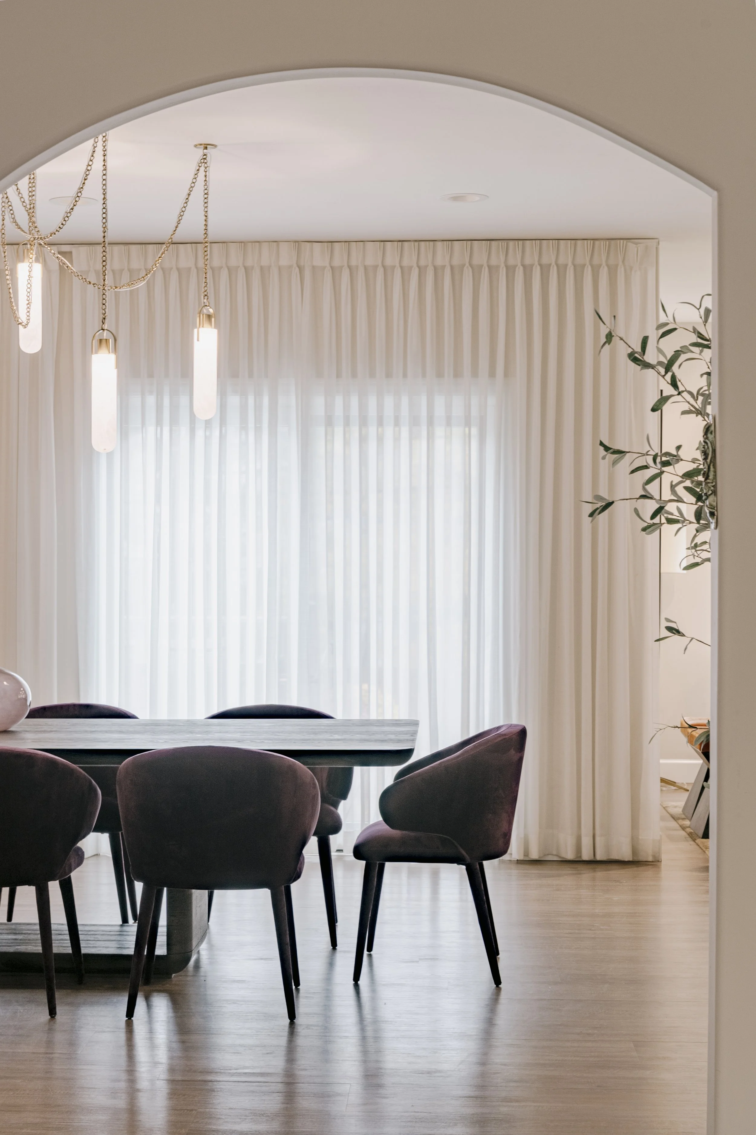 Refined Gatherings kitchen, bathroom, dining room, living room, and social spaces designed by Teela Bennett Design.