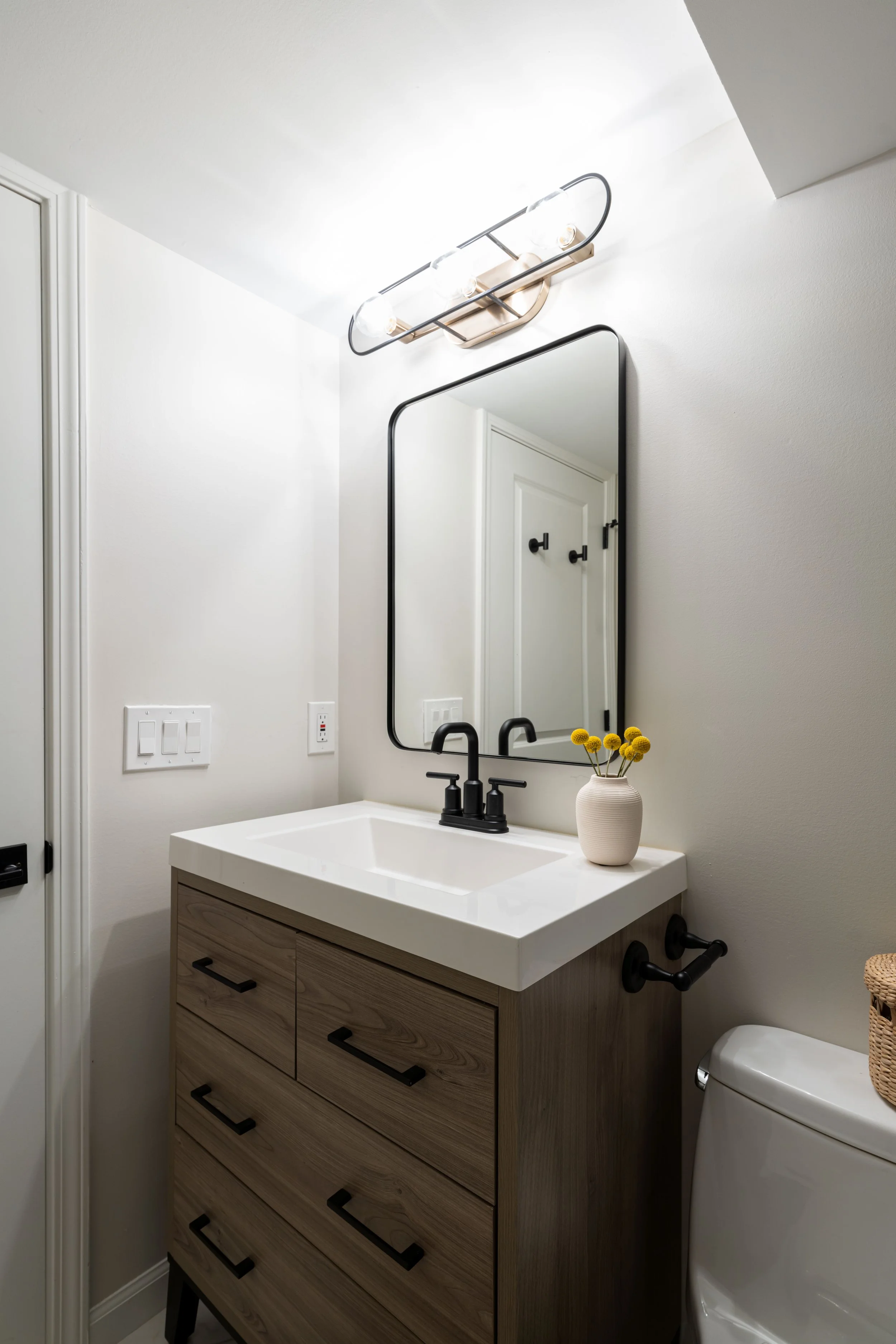 Refined Gatherings kitchen, bathroom, dining room, living room, and social spaces designed by Teela Bennett Design.
