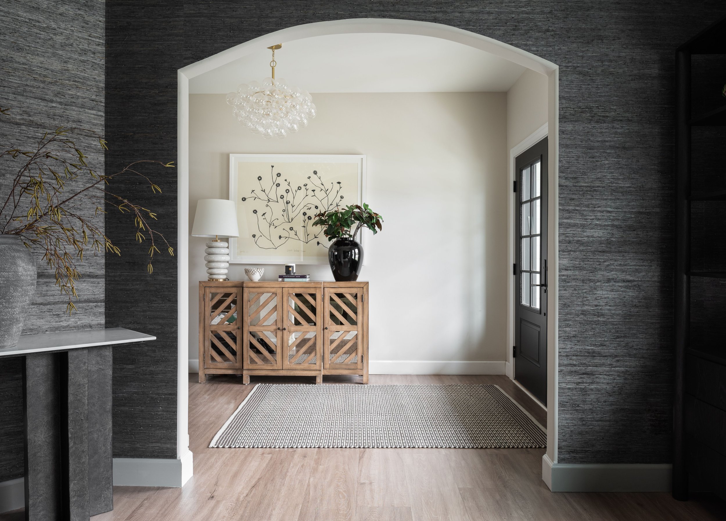 Refined Gatherings kitchen, bathroom, dining room, living room, and social spaces designed by Teela Bennett Design.