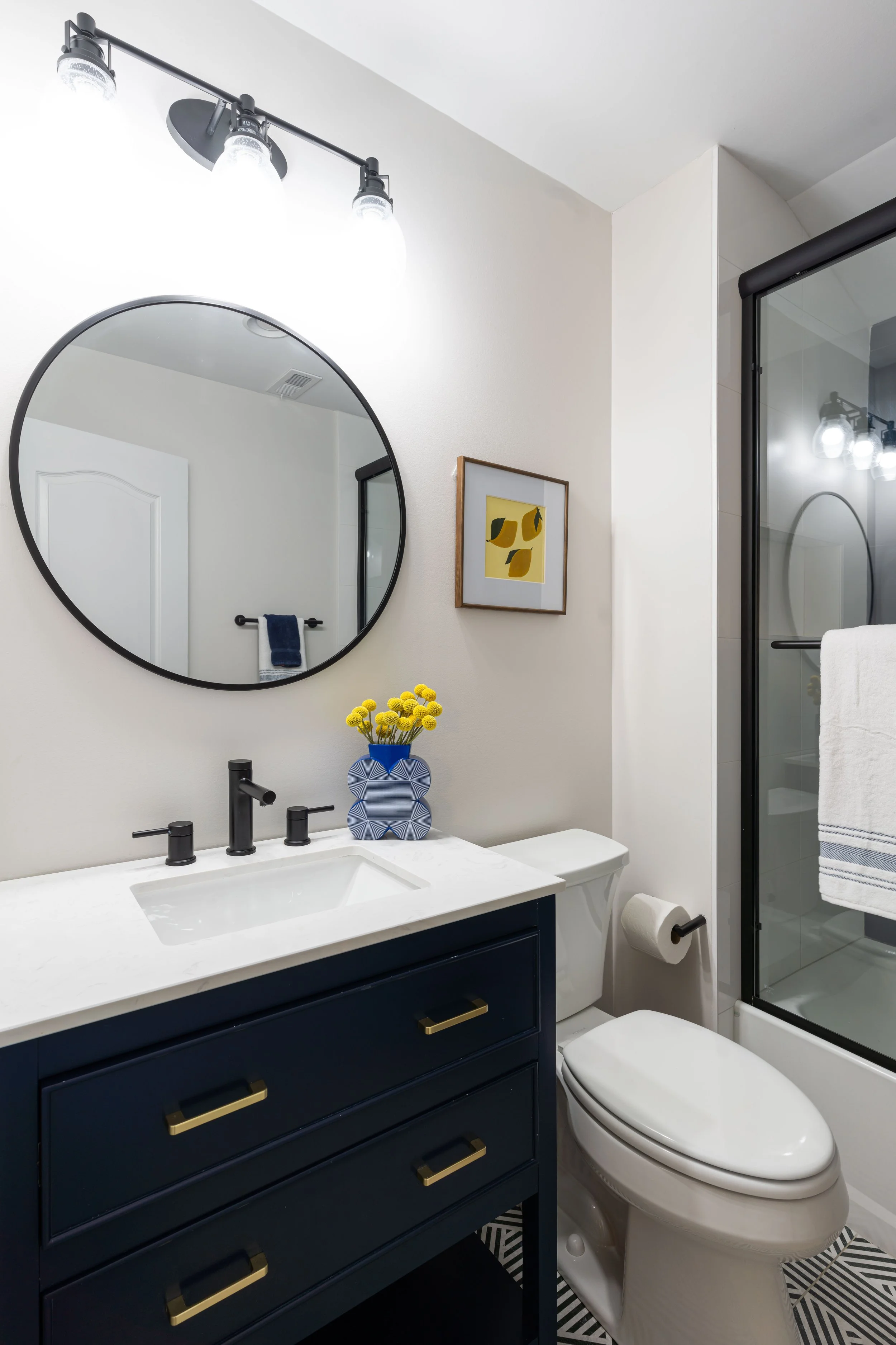 Refined Gatherings kitchen, bathroom, dining room, living room, and social spaces designed by Teela Bennett Design.
