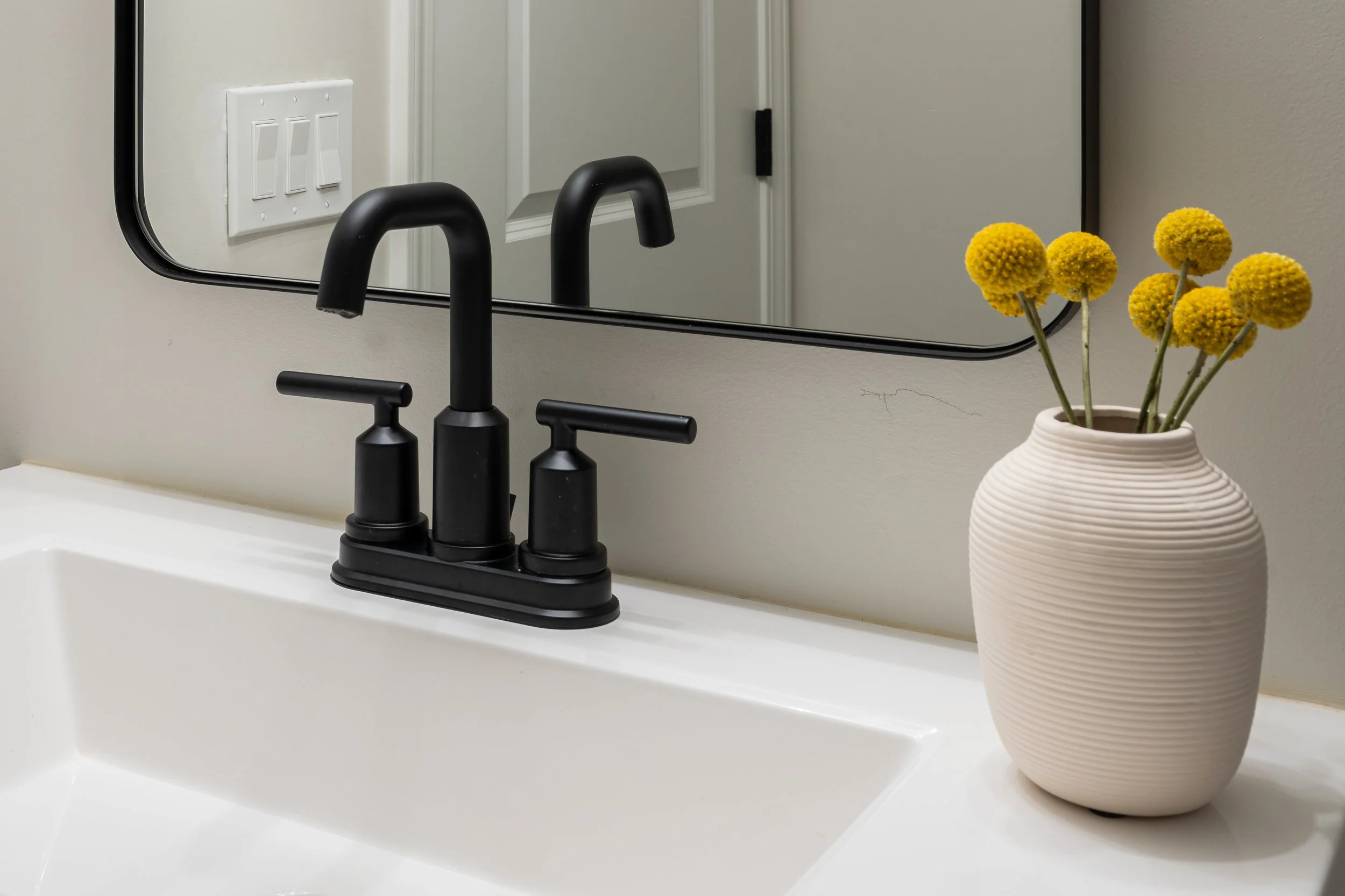 Refined Gatherings kitchen, bathroom, dining room, living room, and social spaces designed by Teela Bennett Design.