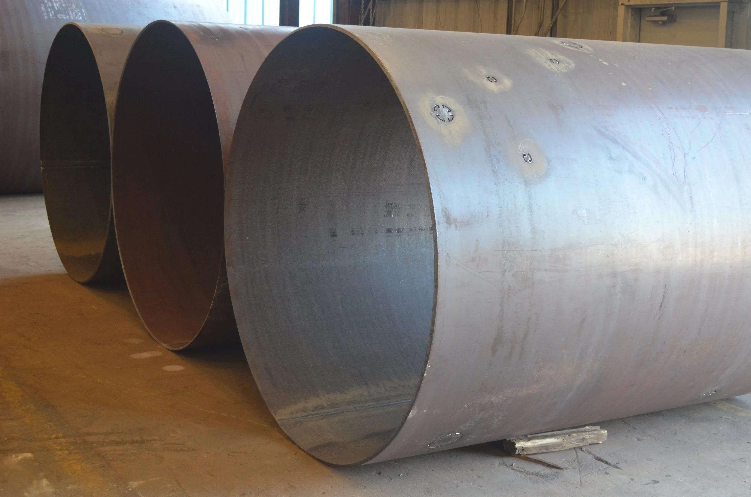 Forming - rolled Cylinders w nozzle cut outs.JPG