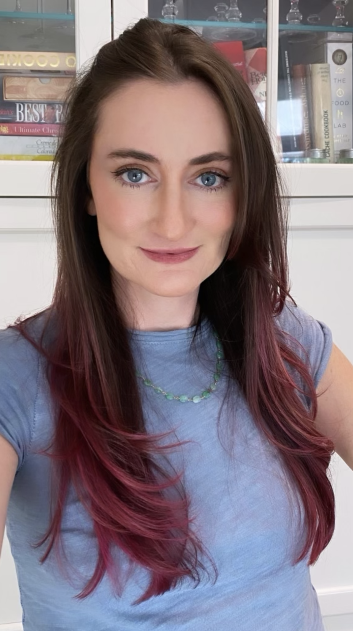 Image of Alexandra Lee Meany. White woman with long brown and pink hair.