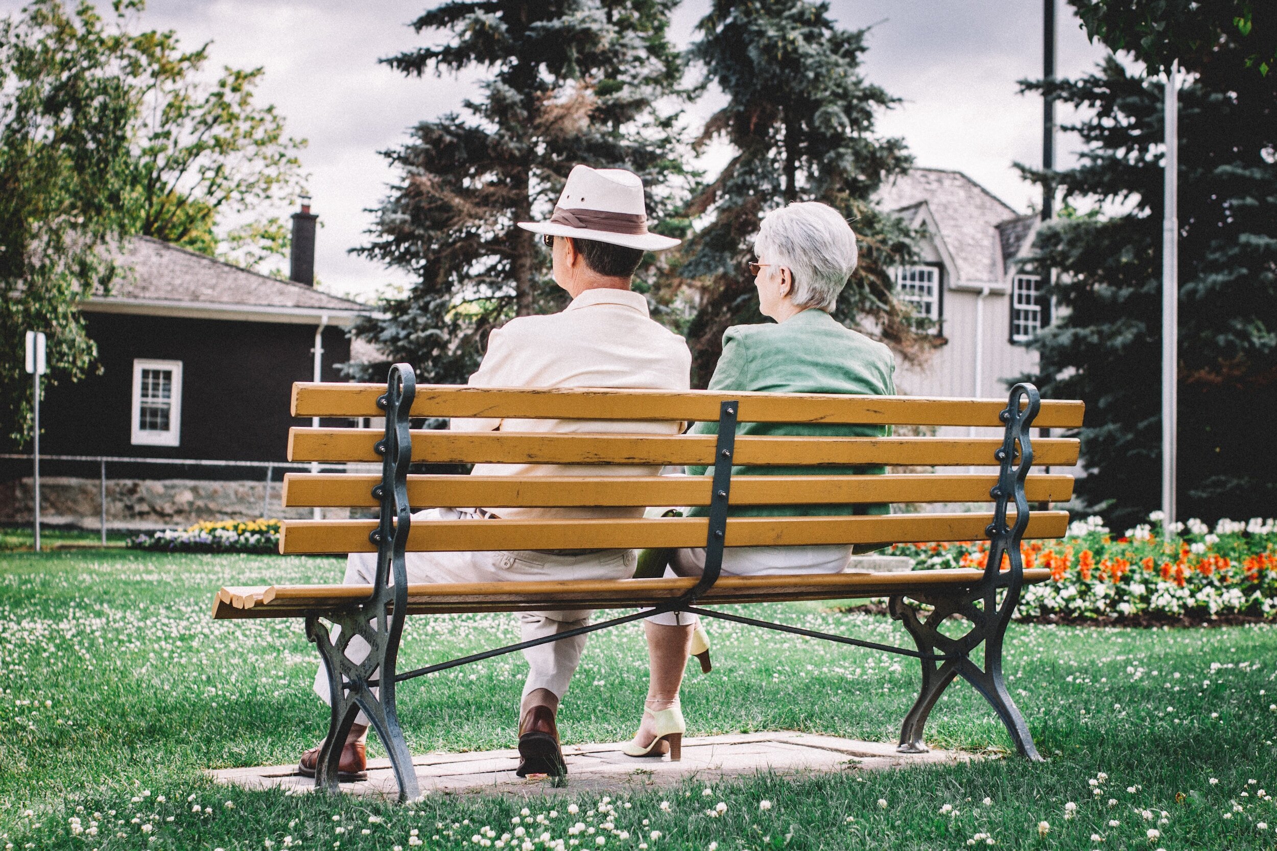 couple sit on bench hospice wisconsin Menominee falls