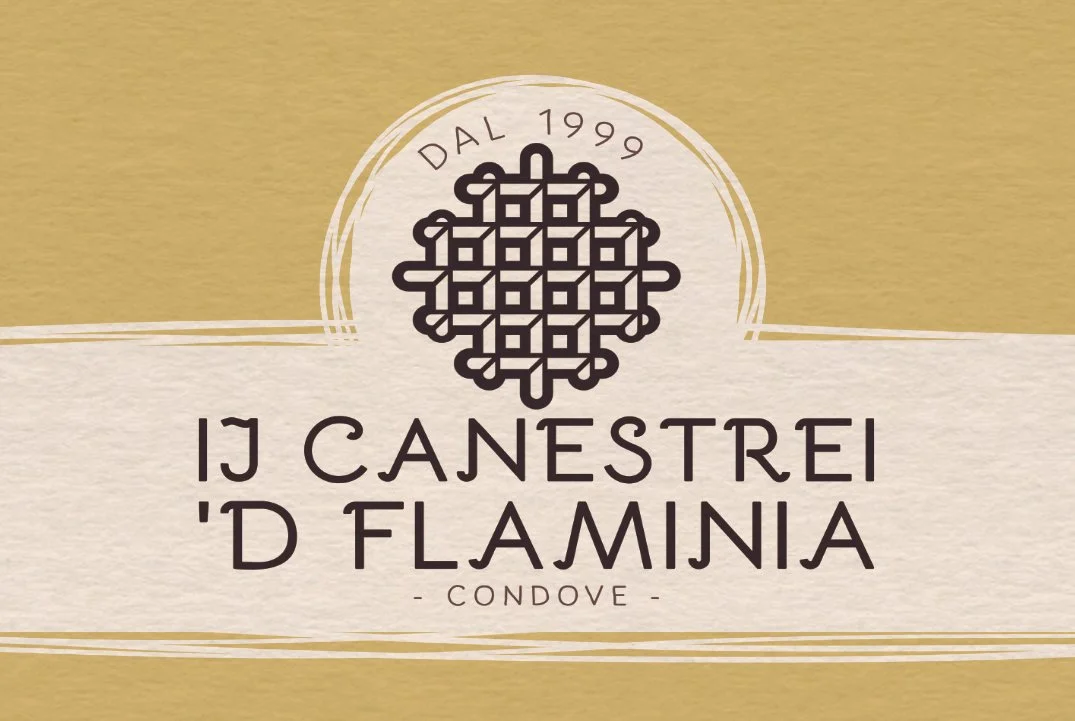 Etichetta di vino con logo decorativo, scritto 'I J CANESTREI D FLAMINIA CONDOVE' e 'DAL 1999'.