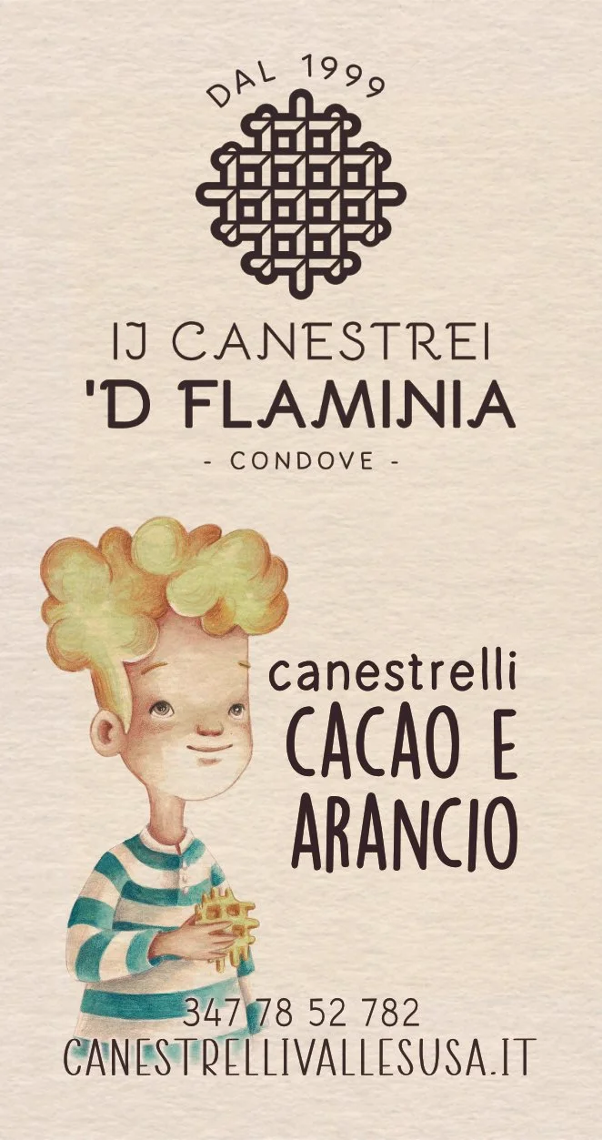 Bambino con capelli di cioccolato e arancia, che tiene un waffle