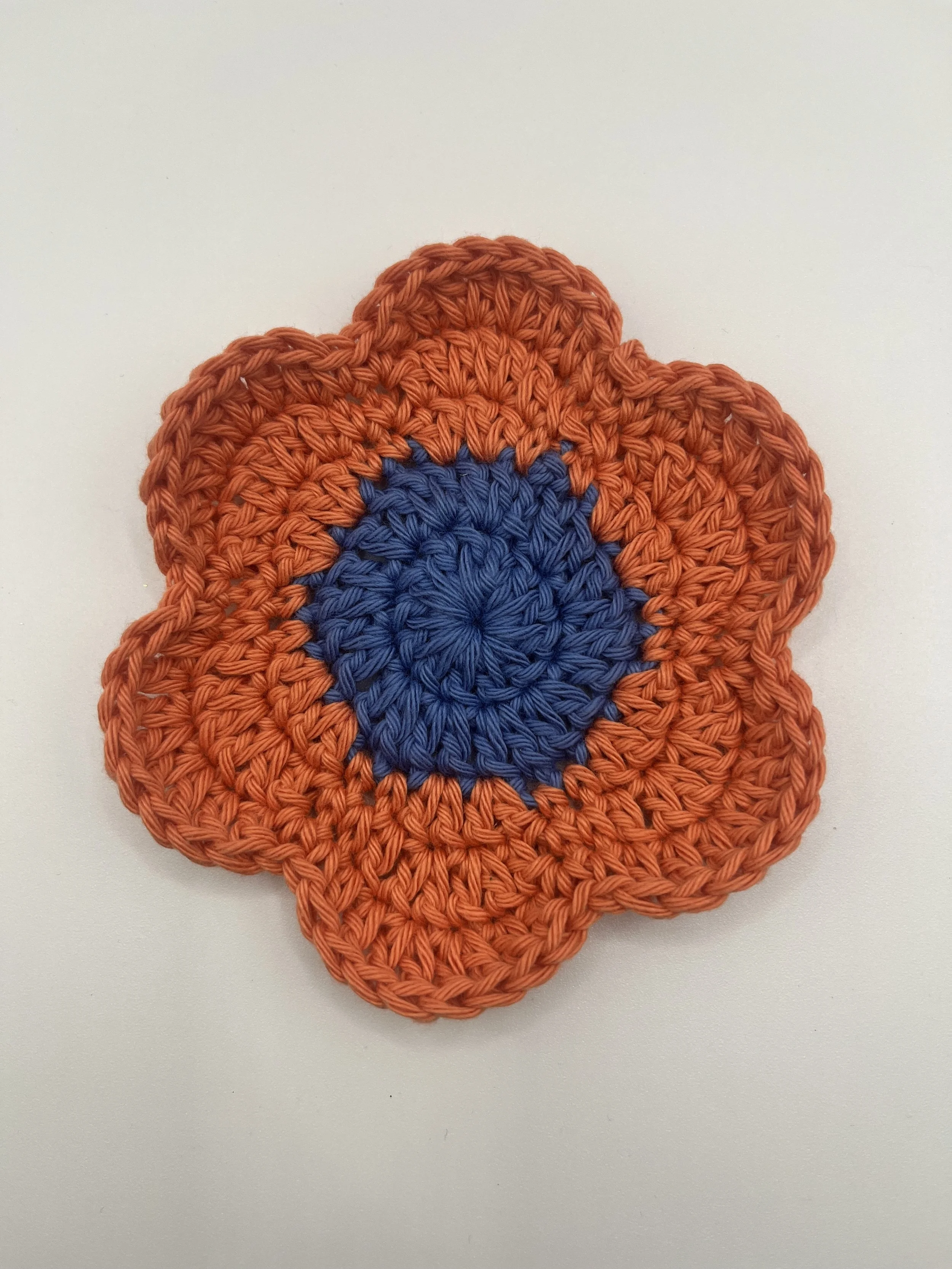 Crocheted Flower Coaster - Blue Centre & Orange Petals