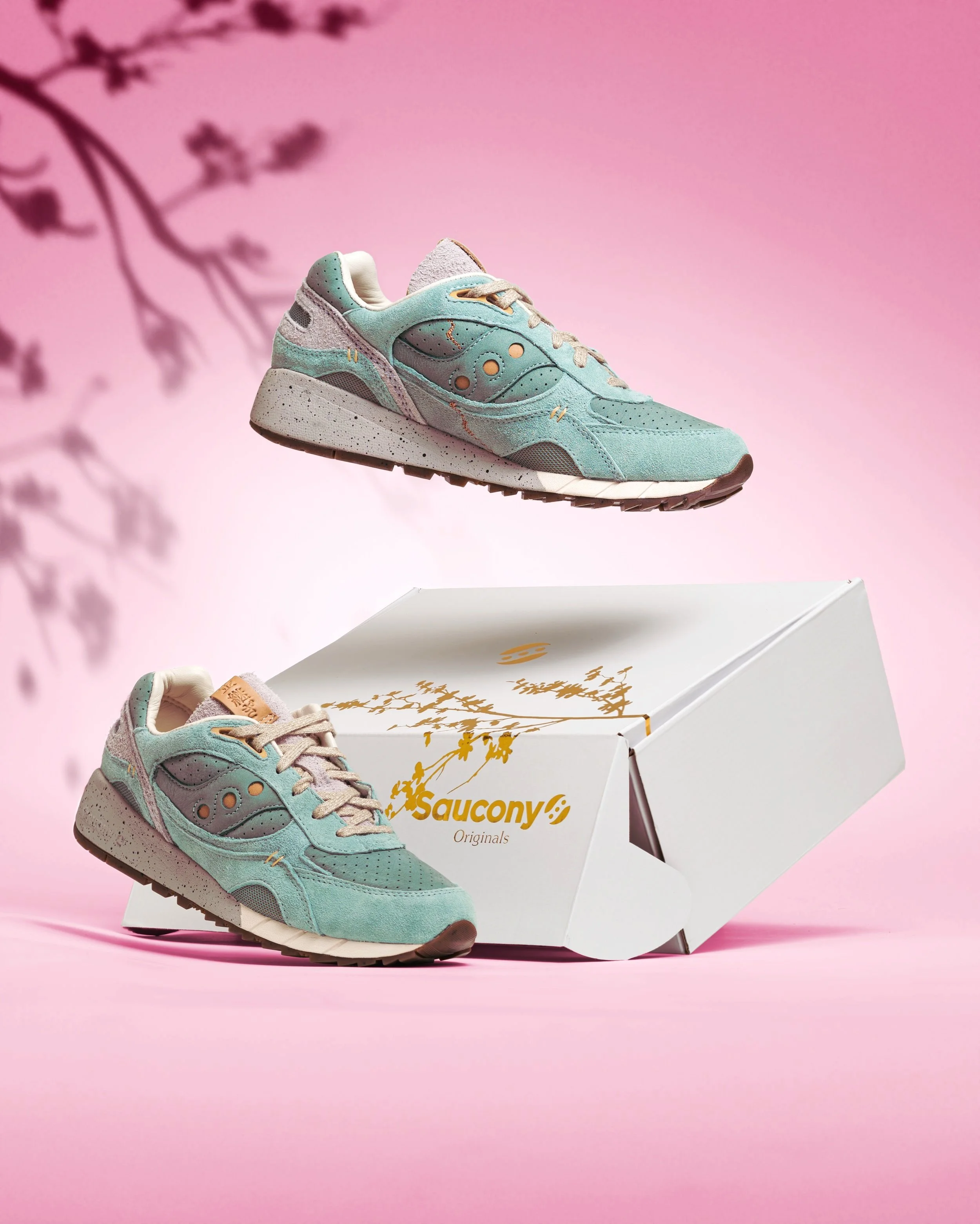 Sneakers on pink background