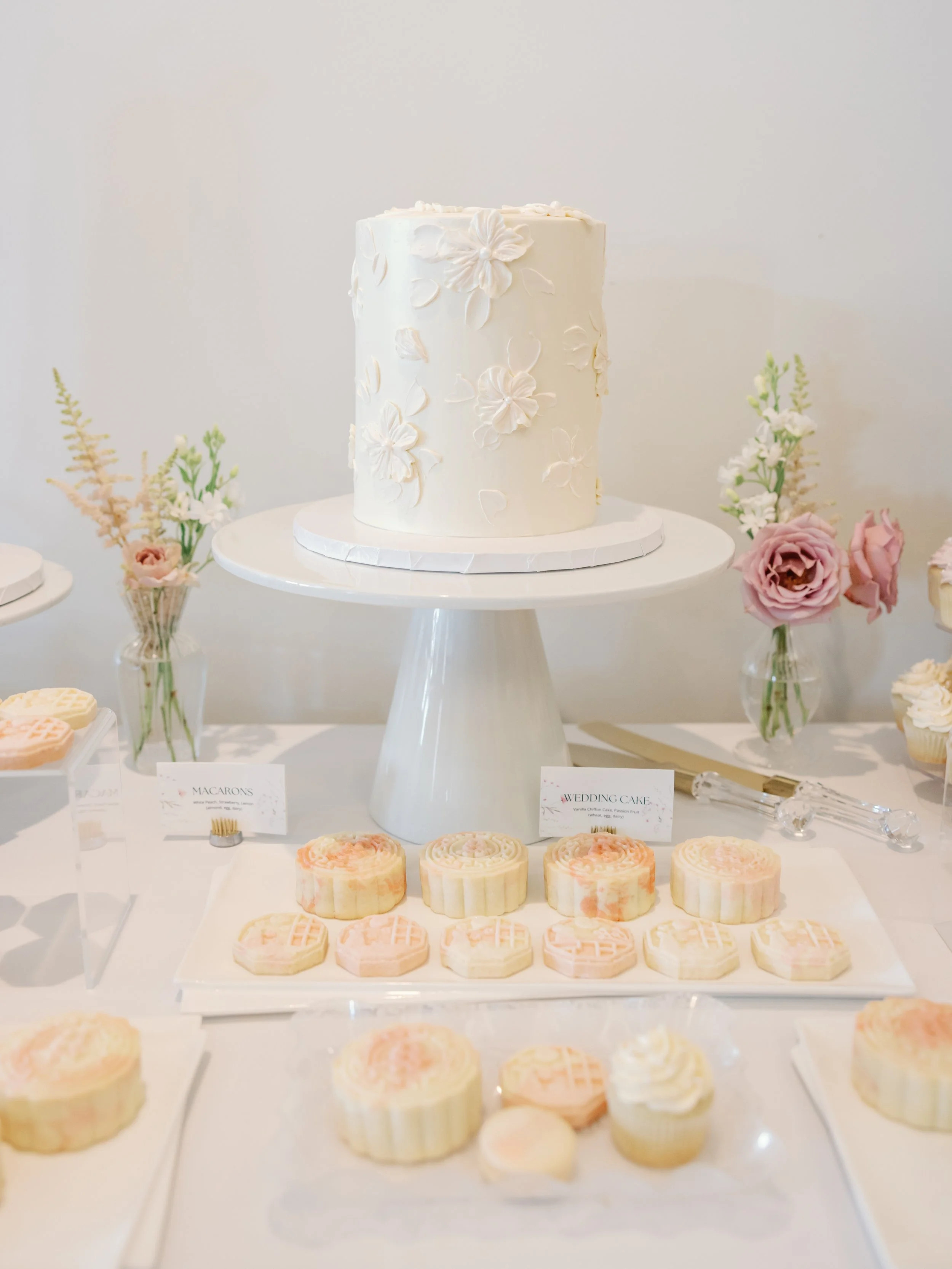 Sweet Dream Bakes custom 2 tier cake with painted flowers and modern mooncakes, Photo by Meilin Photography