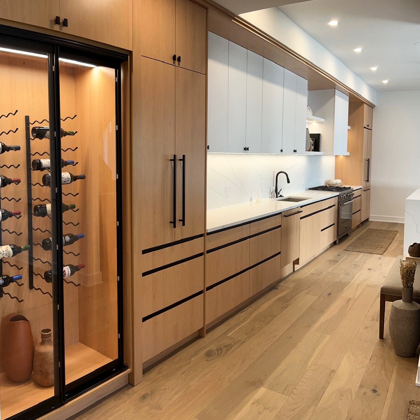 New construction kitchen in Fairmount: Wine display lighting, under cabinet LED strip lights, &amp; recessed lighting 

#winedisplaylighting #electrician #newconstruction