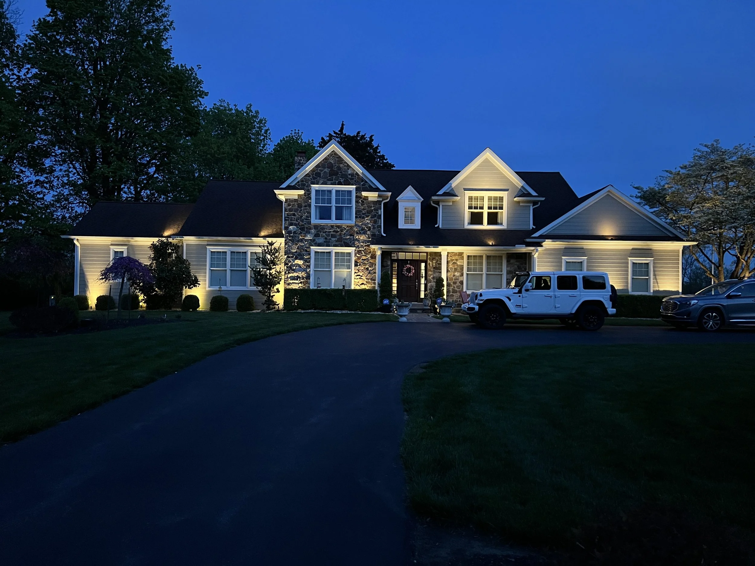 Outdoor landscape lighting installation by Weinstein Electric