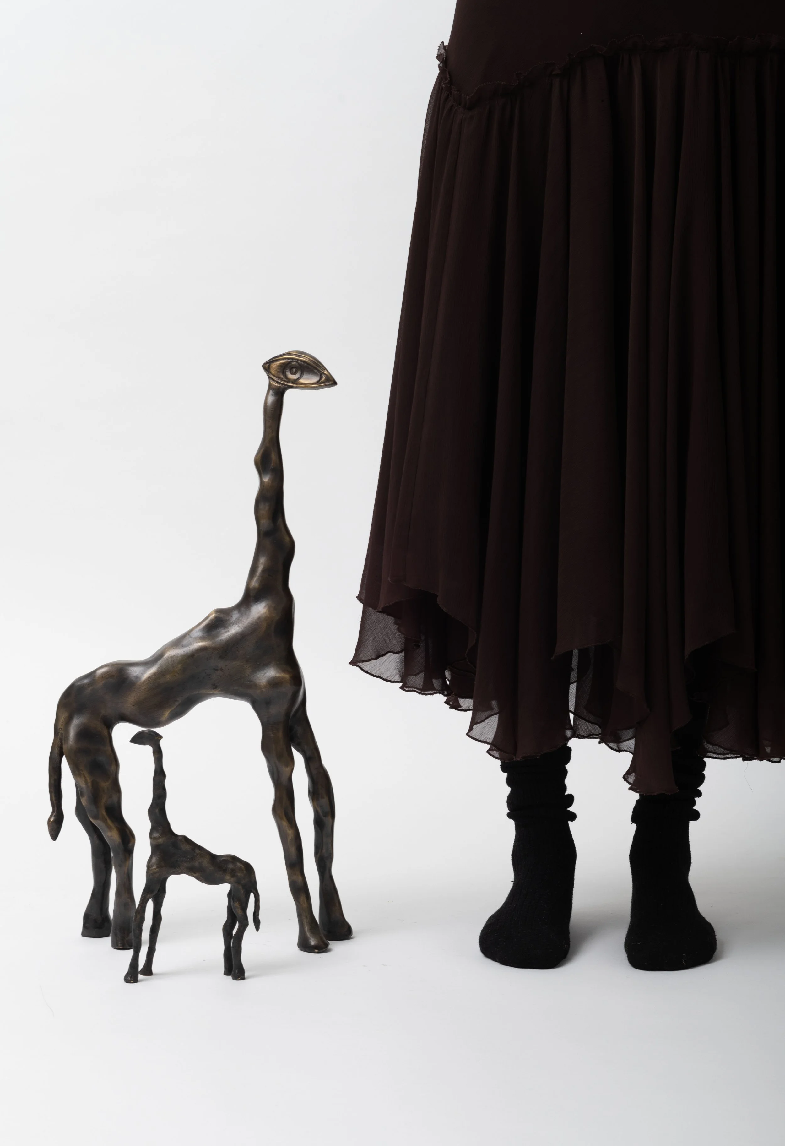 Mother: Jupiter Giraffe I. 2025. Bronze. 60 x 30 x 8 cm.