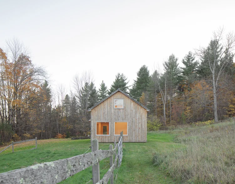 Timber barn in a field