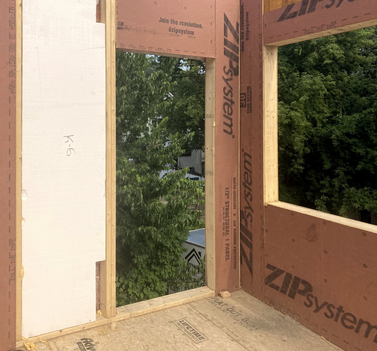 Interior walls fabricated with ZIP system sheathing for airtightness and durability.