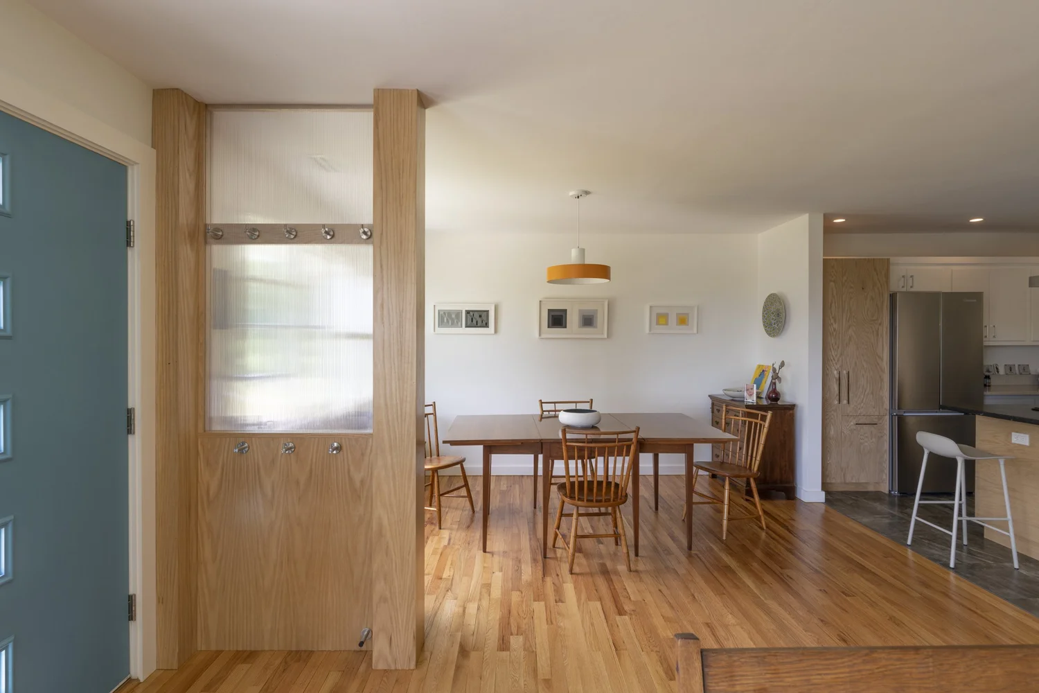 Drumlin House, dining area beside the plywood entry screen