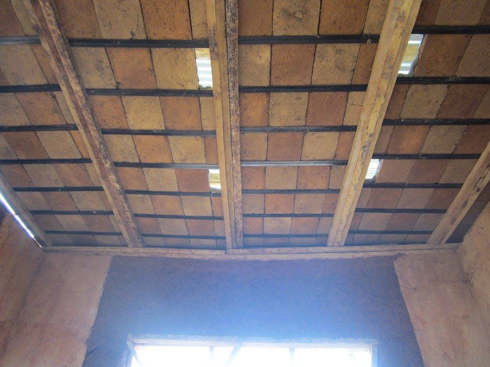 Mudhouse, ceiling panels between the rafters