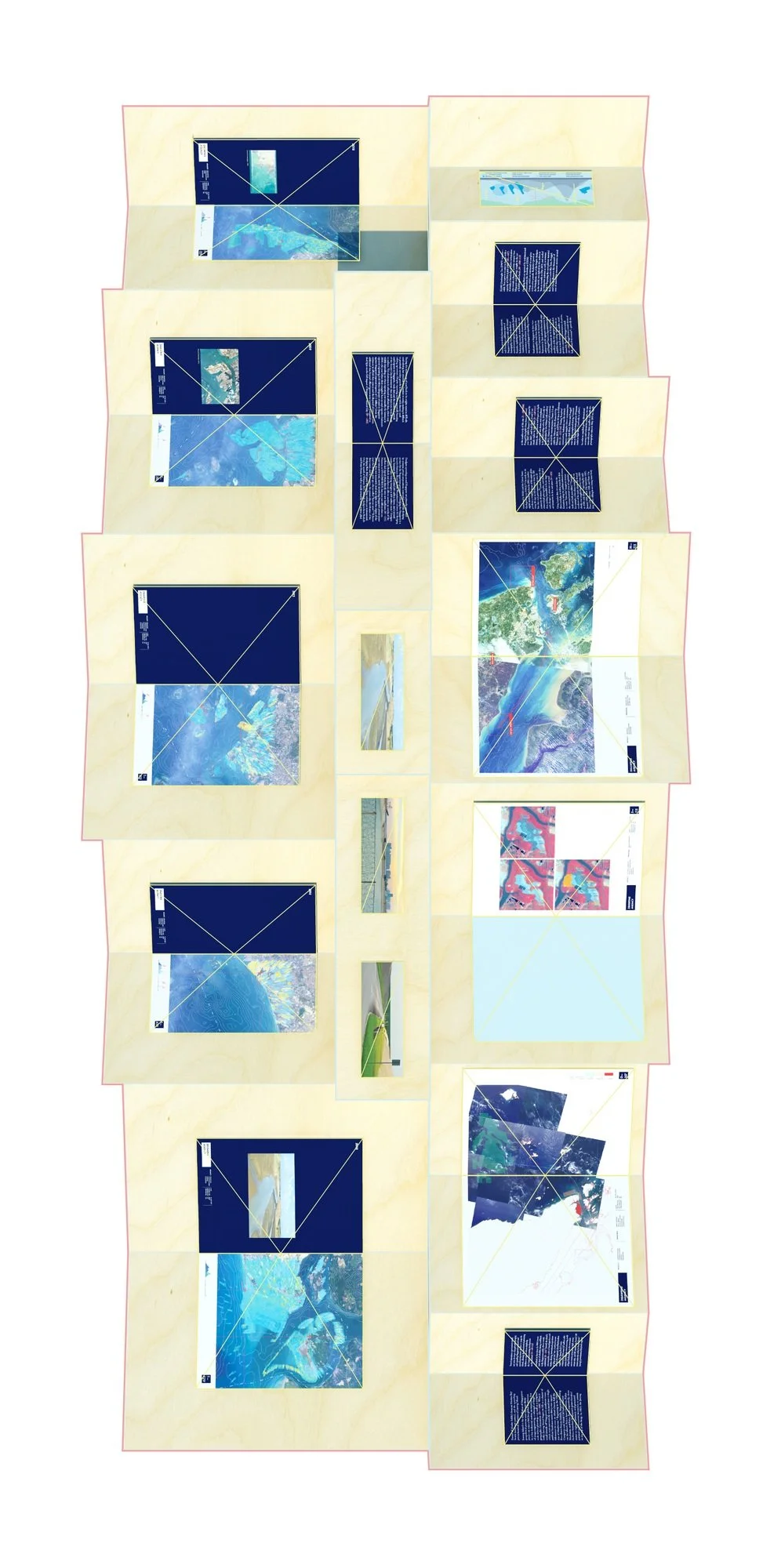 Overhead view of Territories of Territory Extraction exhibition featuring a stepped wood display filled with books and printed satellite images.