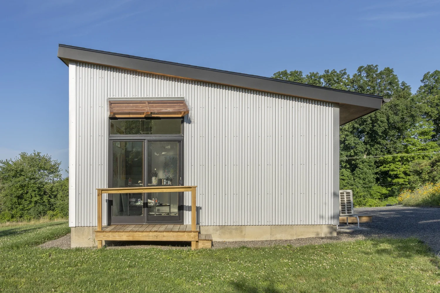 Hemp Art Studio, end elevation with porch and awning