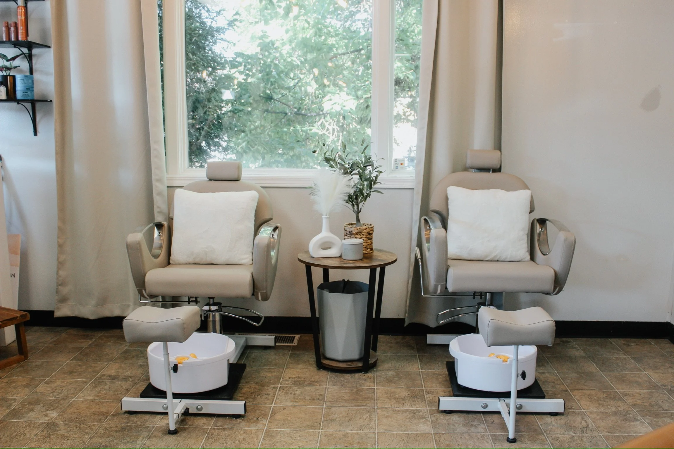 Pedicure chairs inside a nail salon in Bozeman, Montana