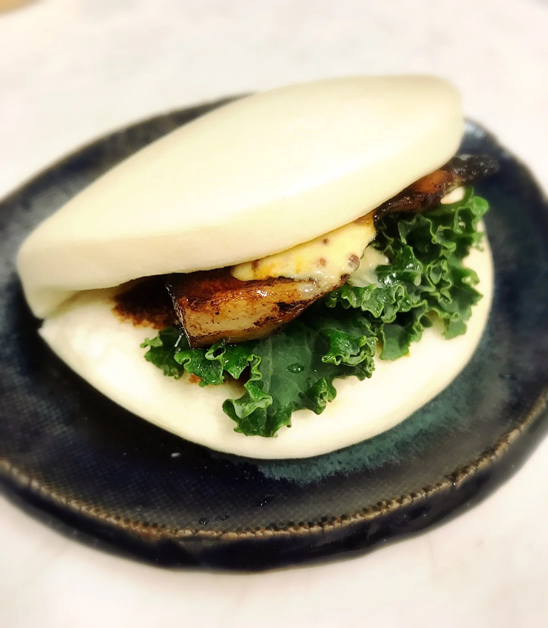 Deep fried chicken wings and pork bun