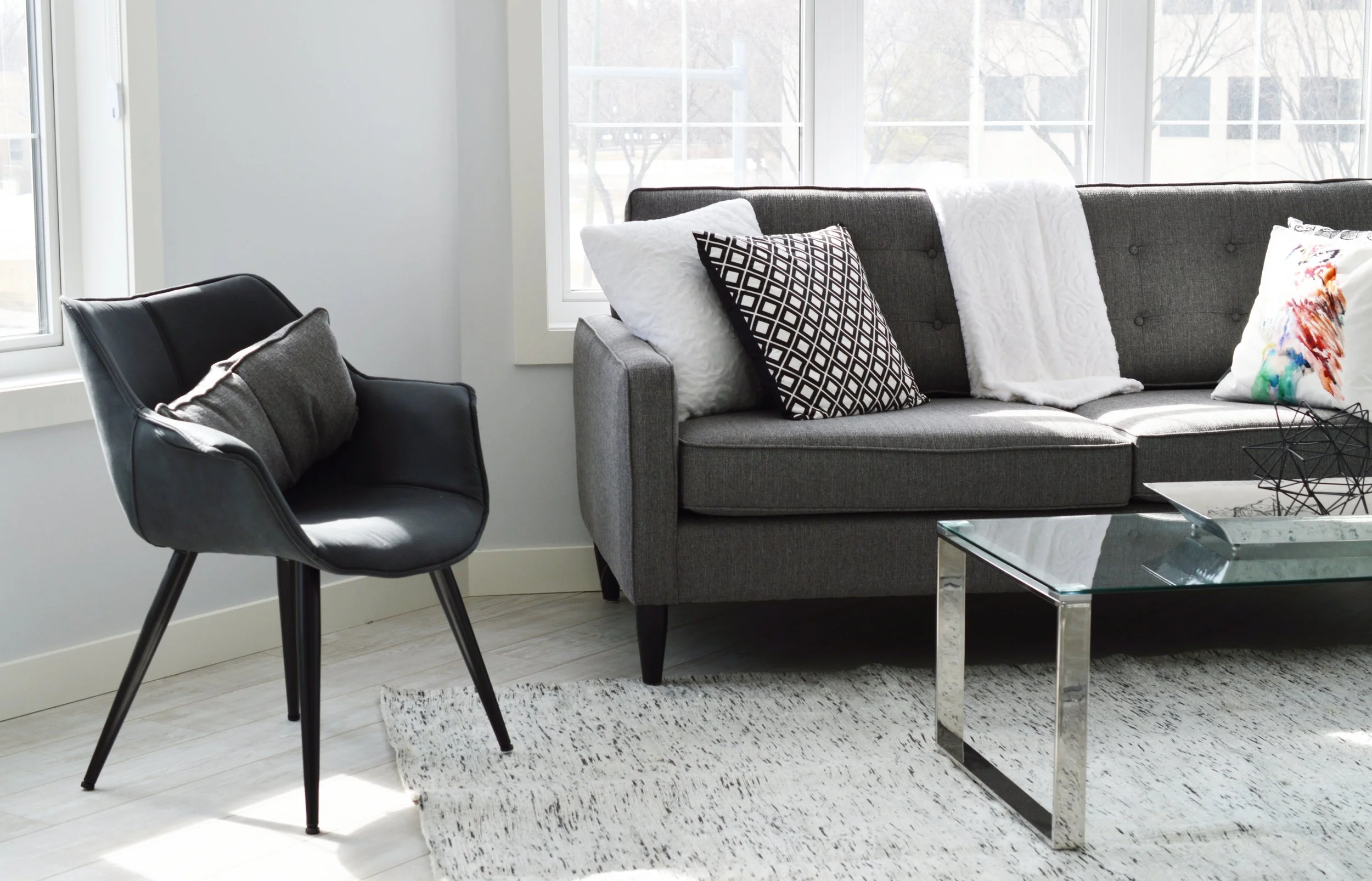 Professional chair next to comfortable couch