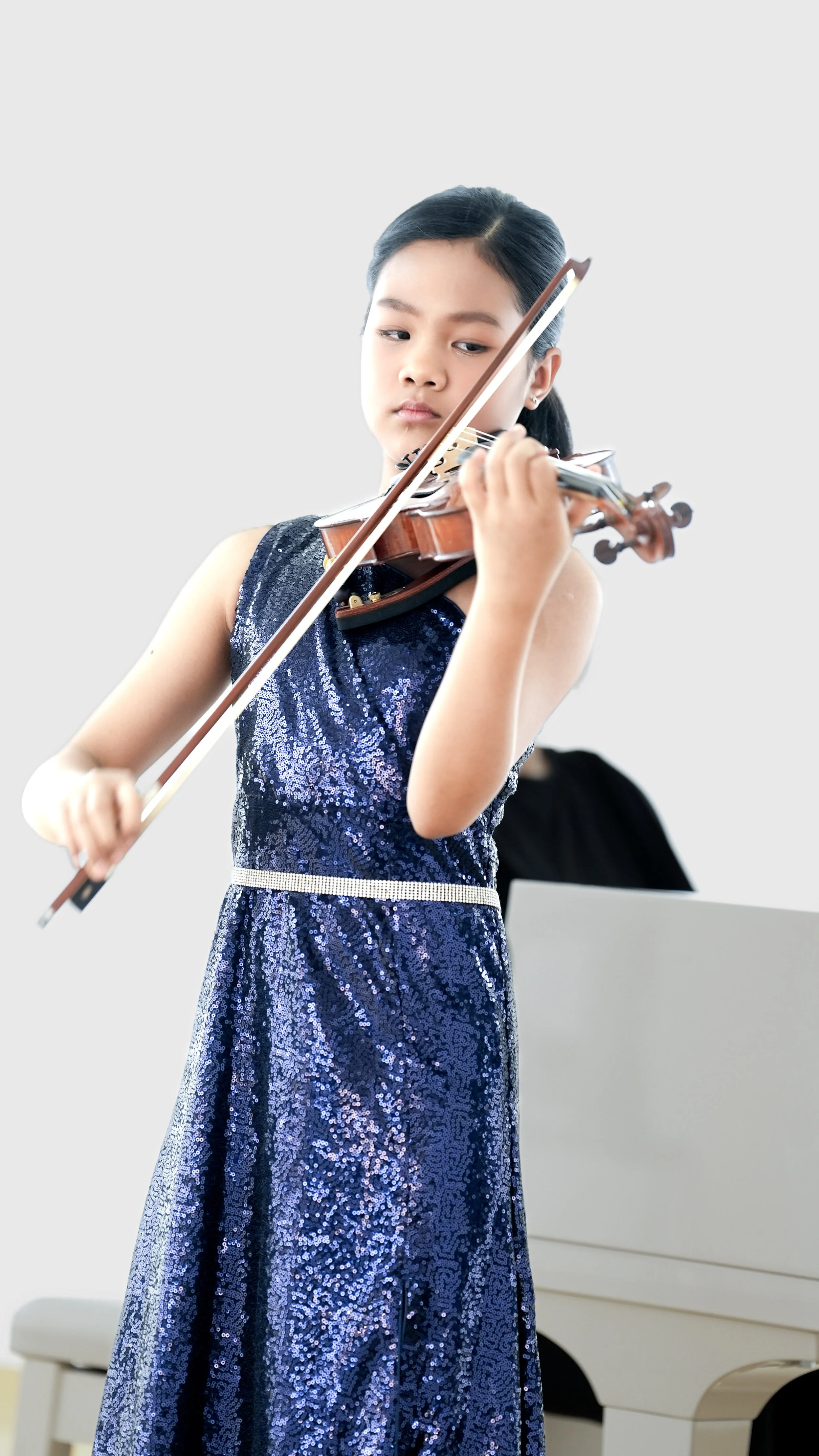 Young violinist performing at York Region Music Academy