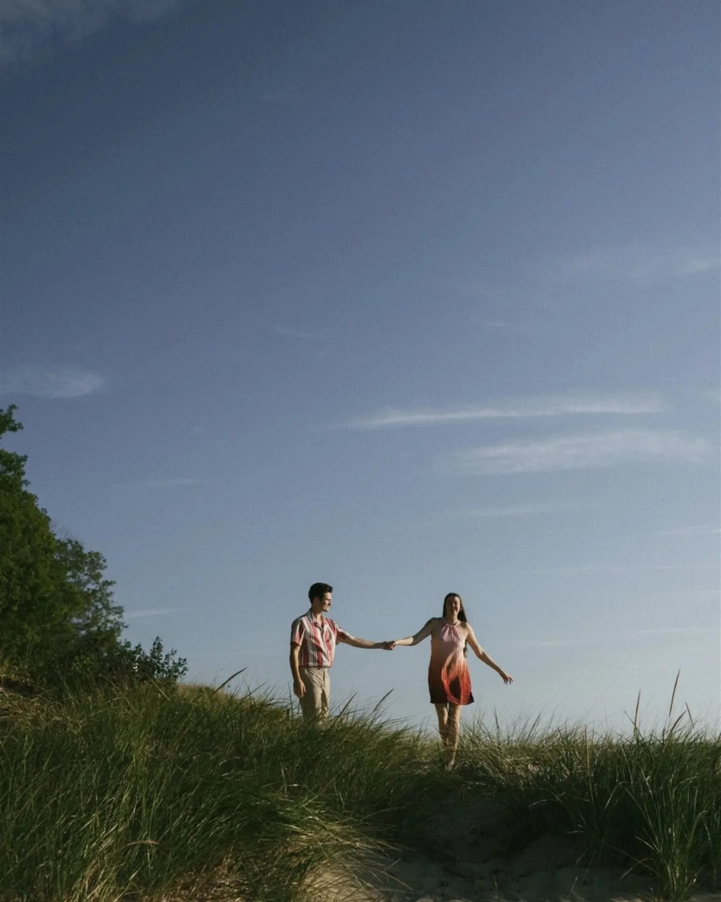 Olivia and Connor brought their A game to Lake Michigan last month for one of the most fun engagement sessions ever. We took so many photos this session that I'm going to have to share them all in different posts because it's all too good to narrow d