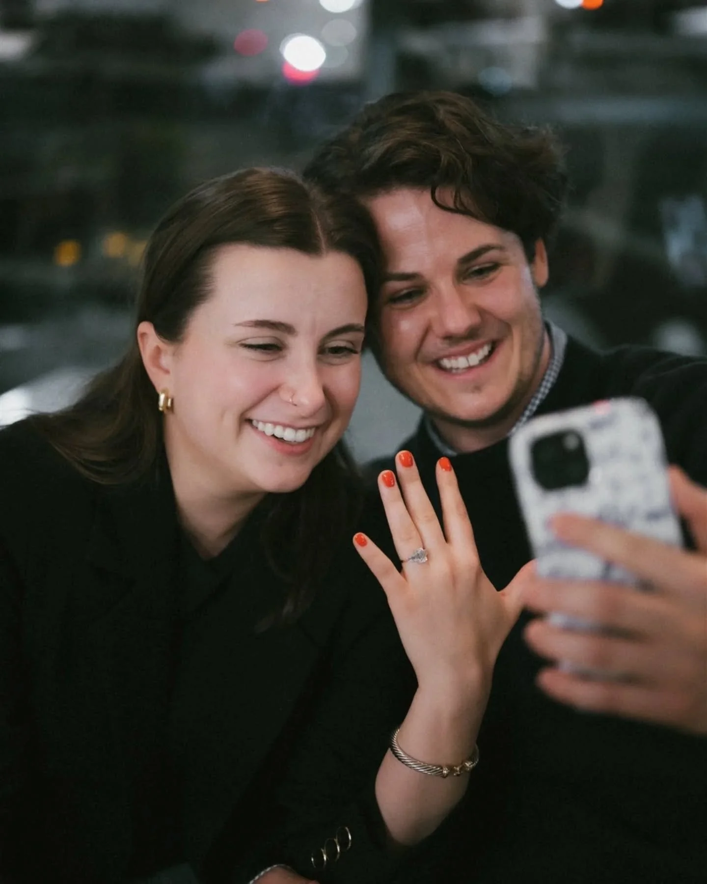 Xan rented out @vertexcoffeeroasters downtown Ann Arbor + pulled out all the stops to propose to Helen. A trail of candles, flowers, and pictures of the two of them led the way, and they celebrated the moments after by sharing some lattes + taking so