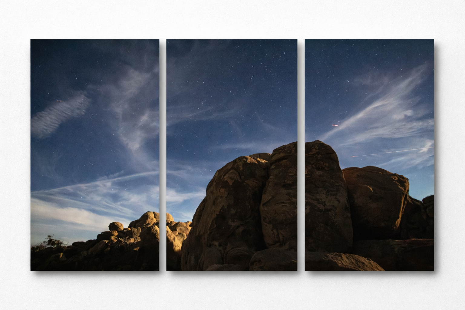 Rocky desert under starry sky.png