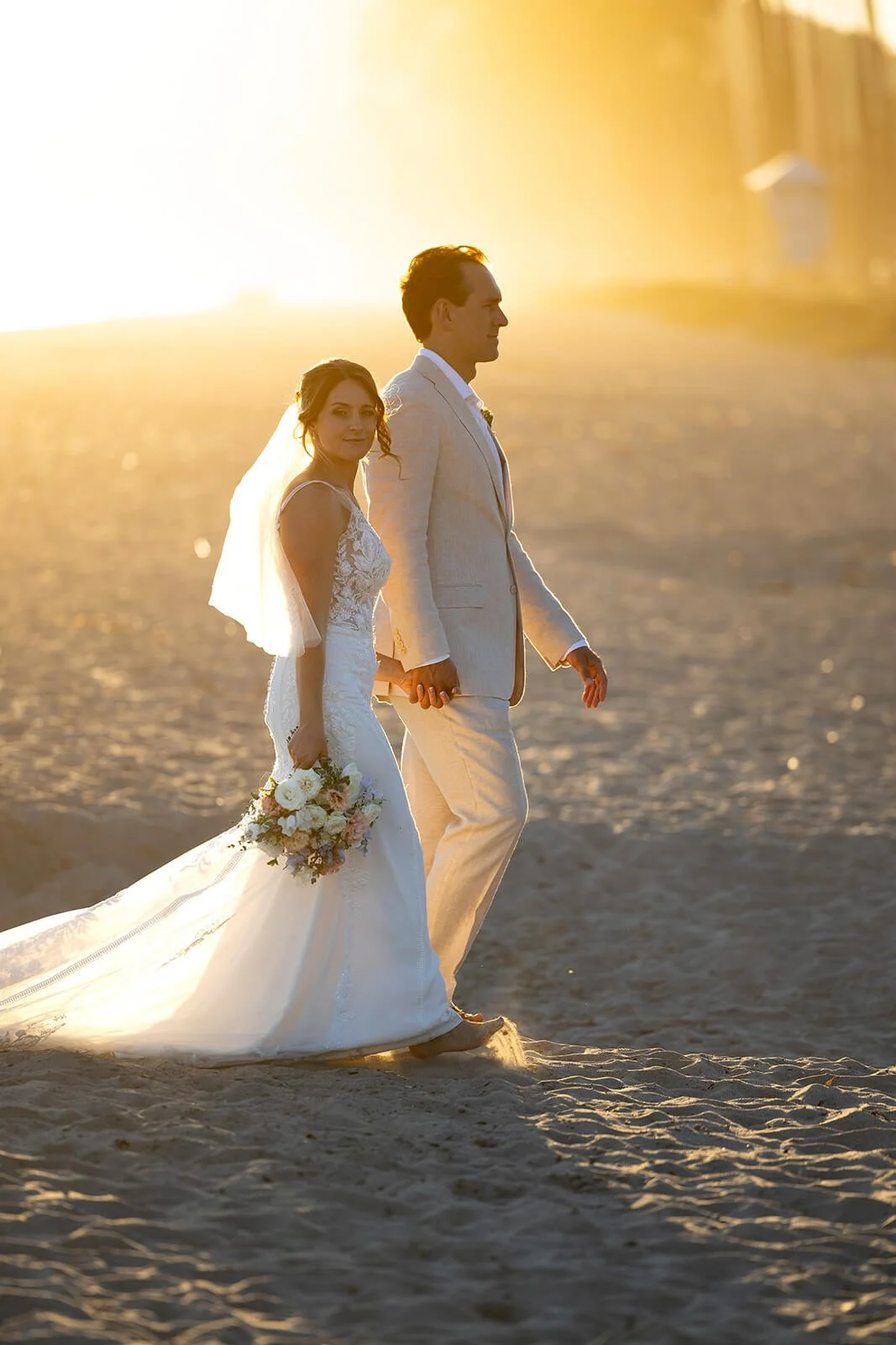 Sunset wedding photos at East Beach Santa Barbara California