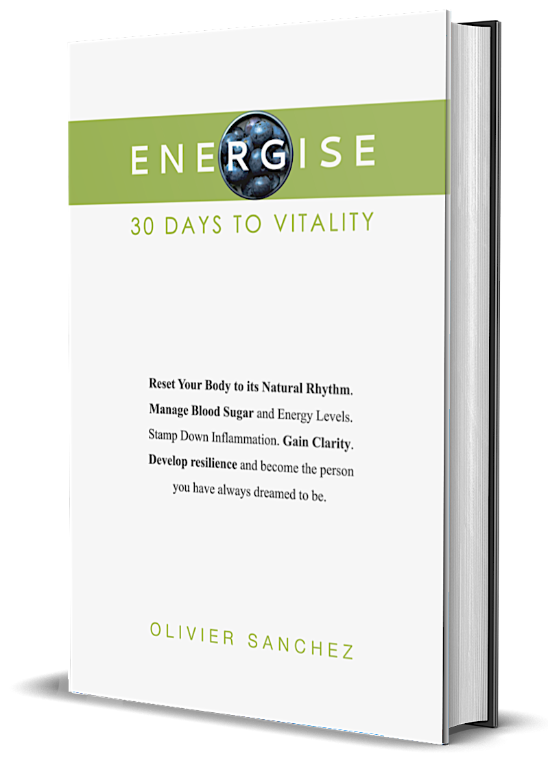 Book titled "Energise: 30 Days to Vitality" by Olivier Sanchez, featuring a green stripe with a globe image and text about health benefits.
