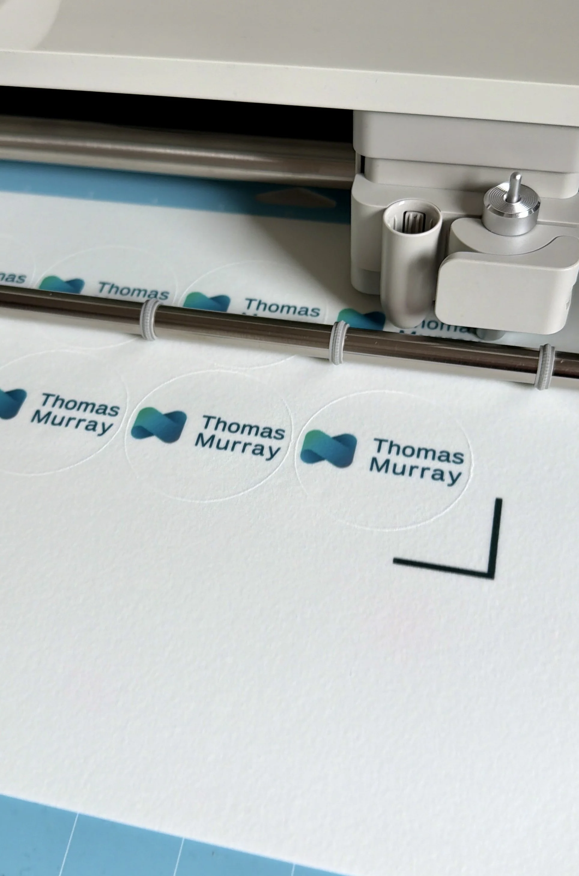 cutting logos for cupcakes.jpg