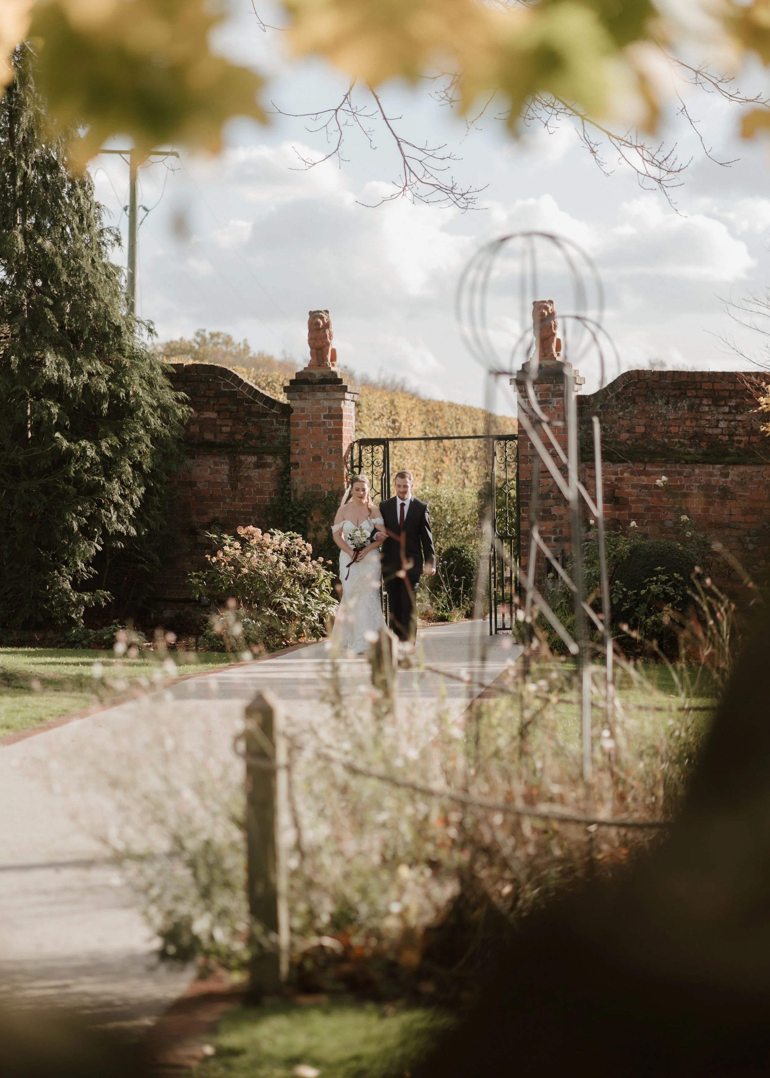 bride walking down the aisle at gaynes park wedding venue in essex