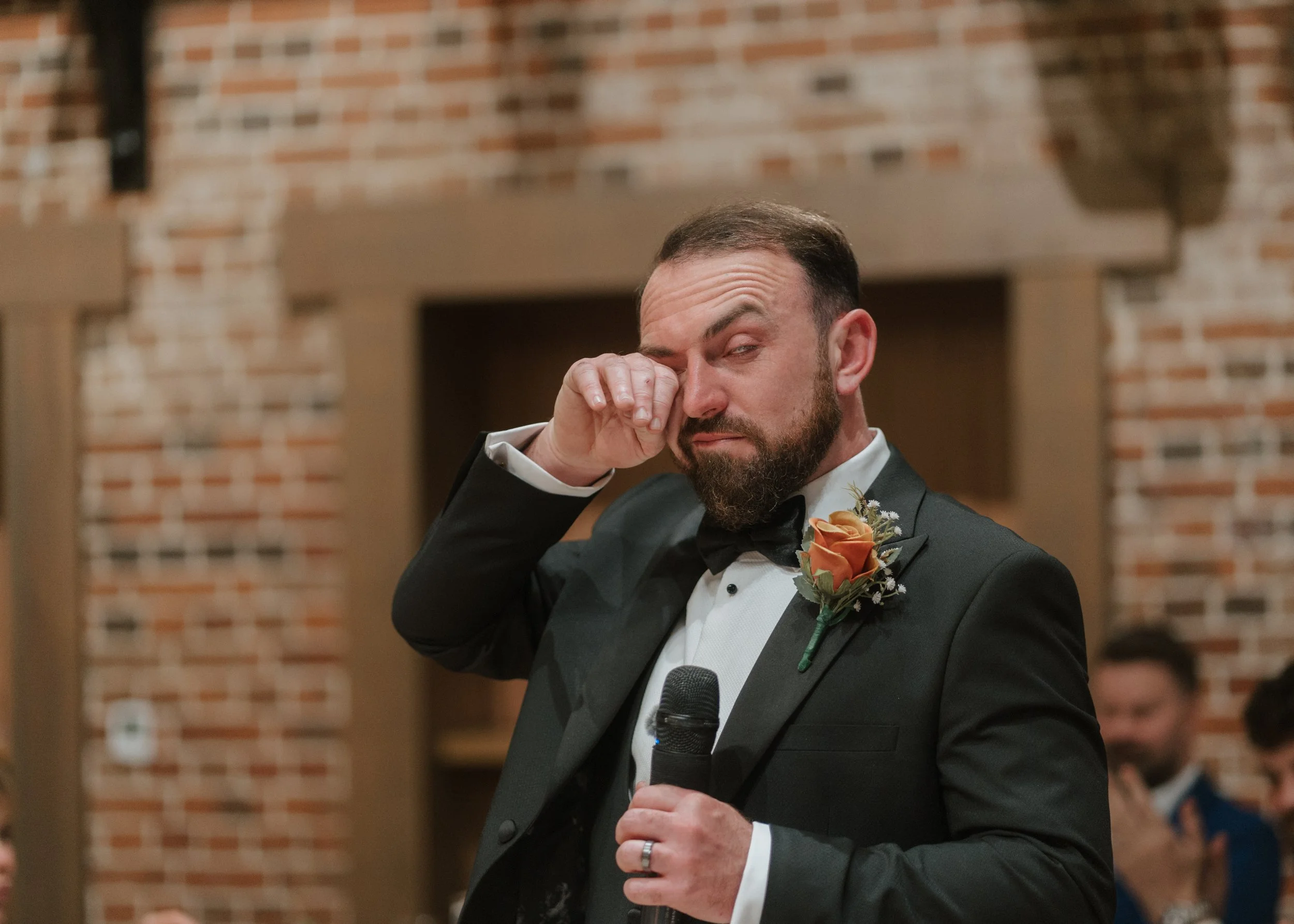 groom crying during emotional speech at his wedding at high house