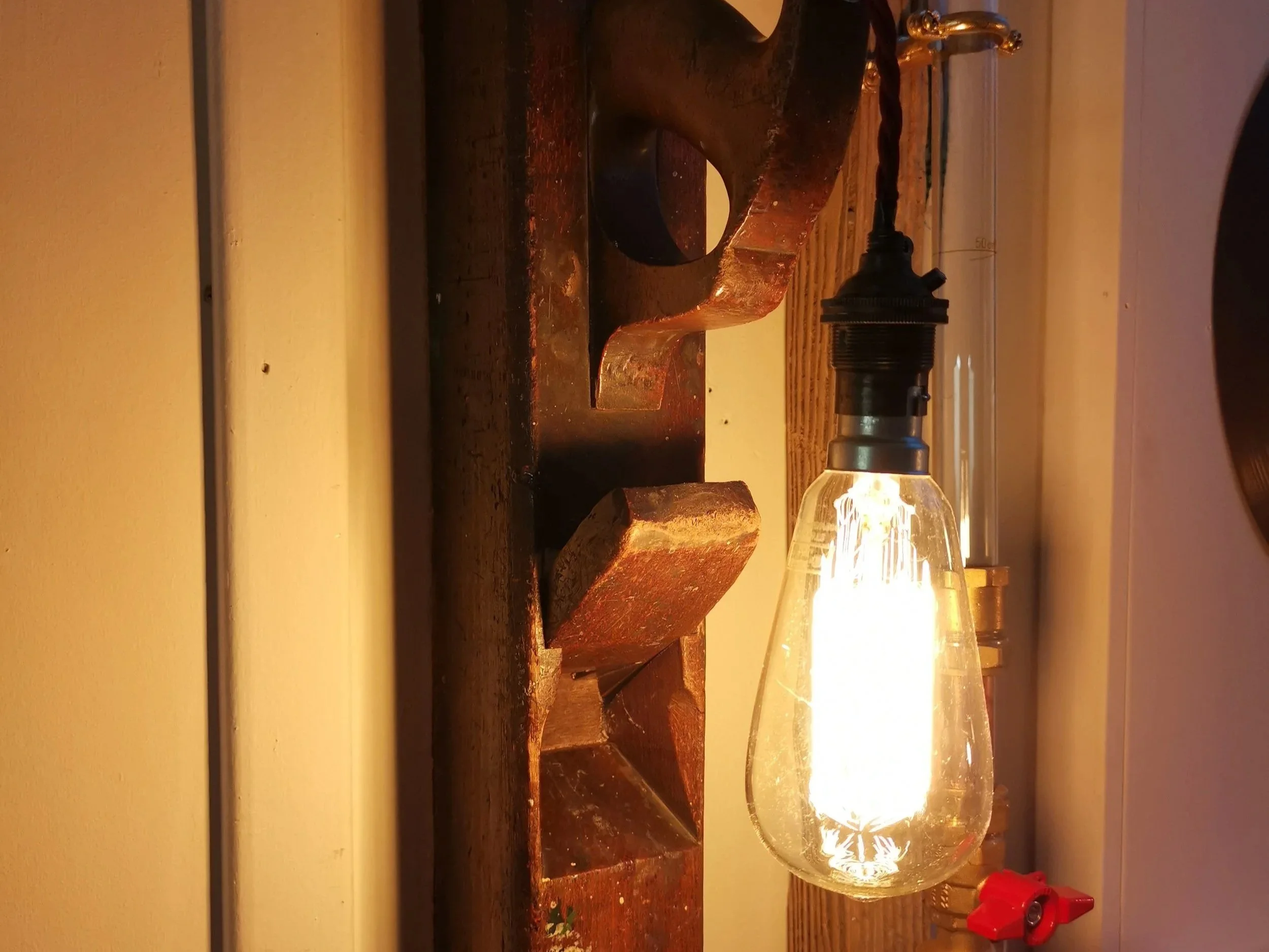 Wooden plane upcycled into a lamp. 