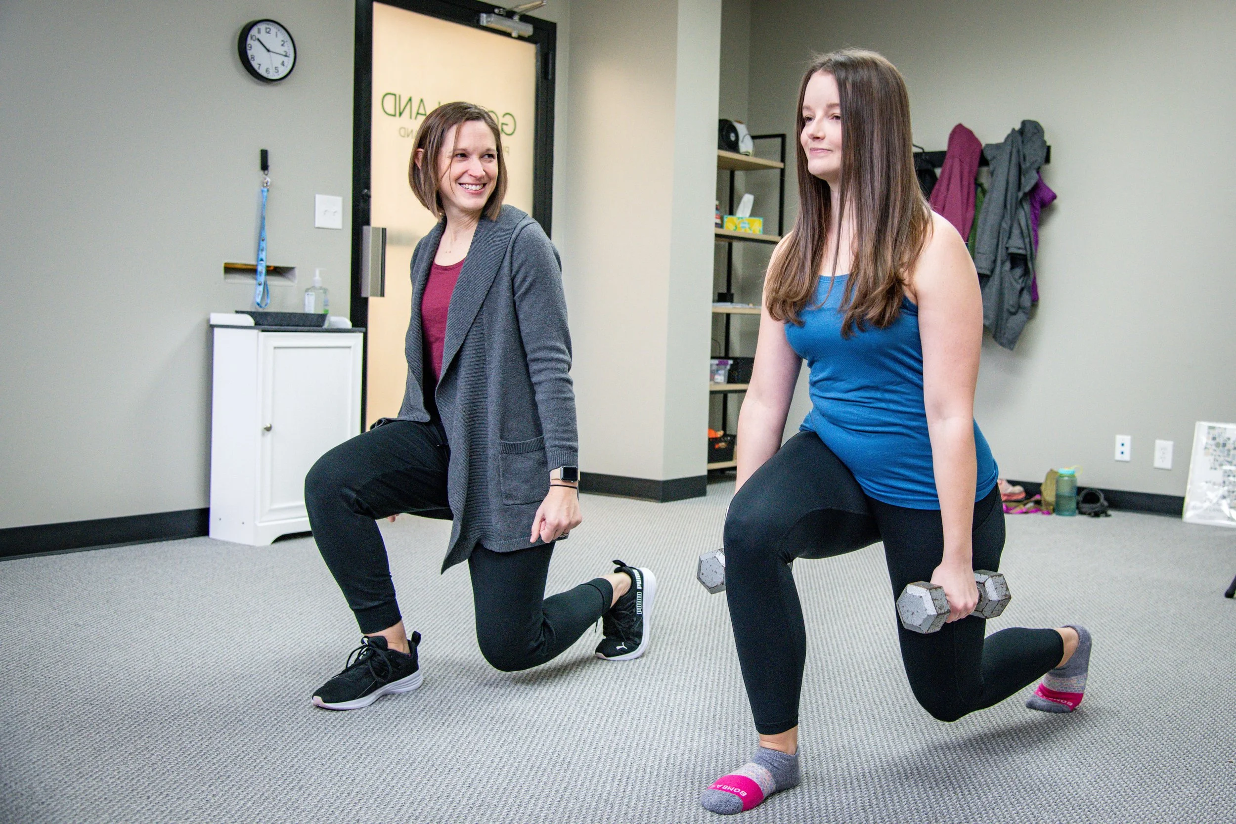 Photo of Sarah Meuler, PT, DPT doing lunges with a patient.