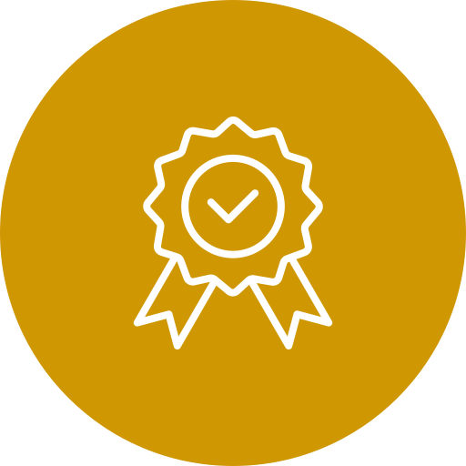 A white line drawing of a ribbon or badge with a checkmark inside, set against a gold circular background, representing certification or achievement.
