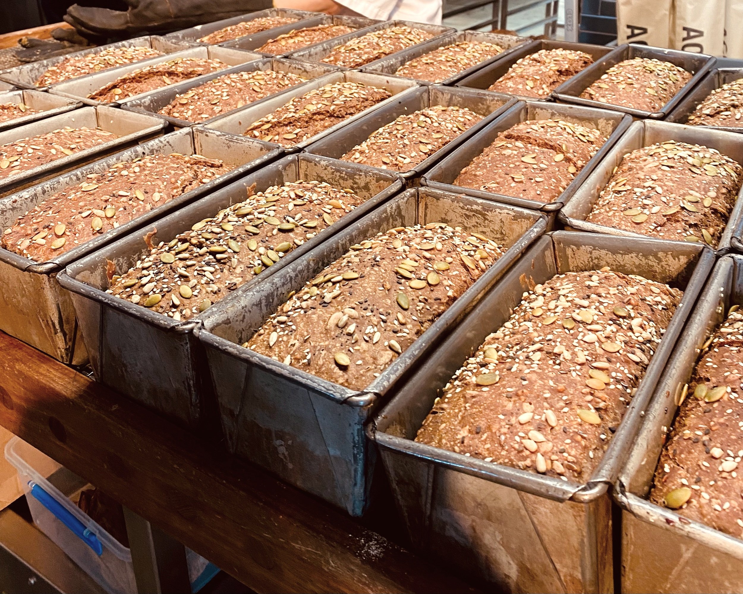 Acme Danish rye loaves in tins