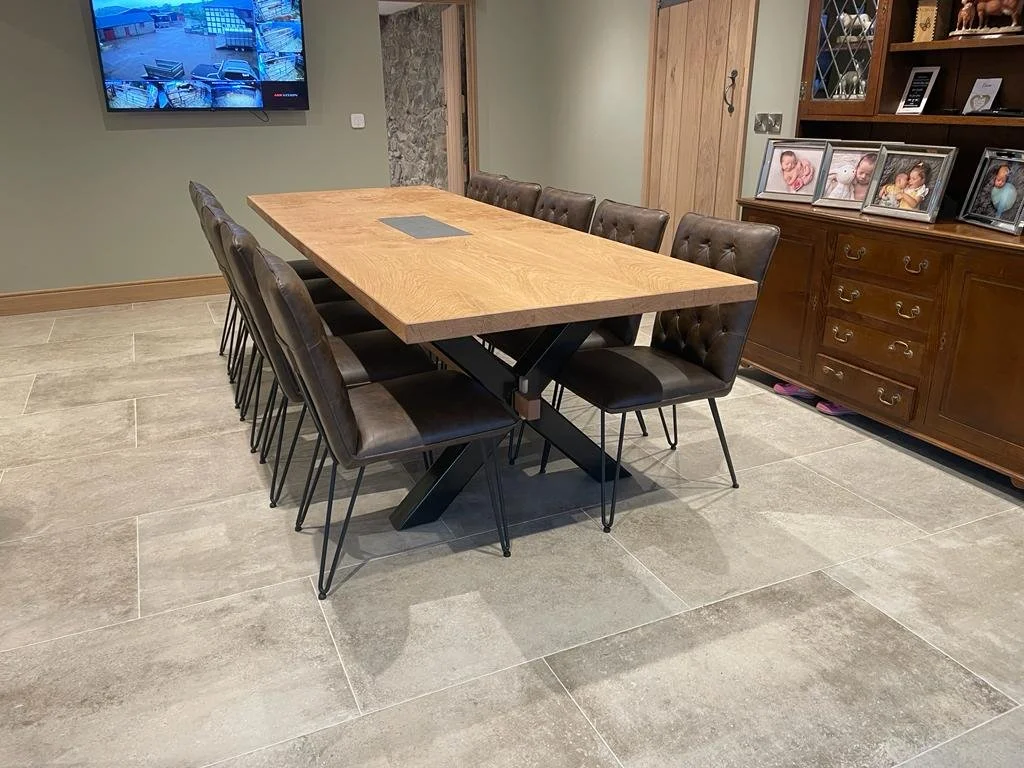 Oak and slate dining table. Prices vary.