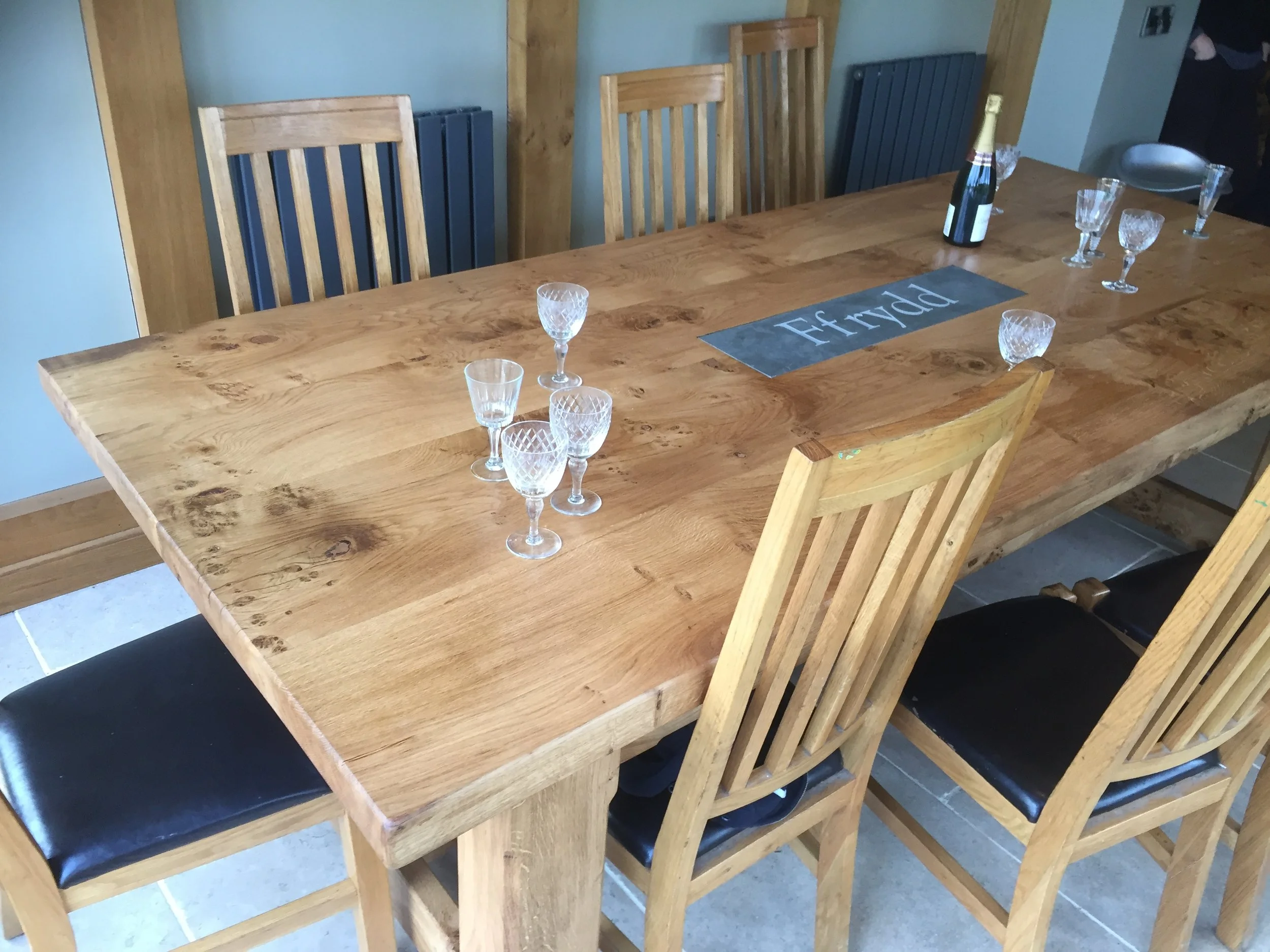 Oak and slate dining table. Prices vary.
