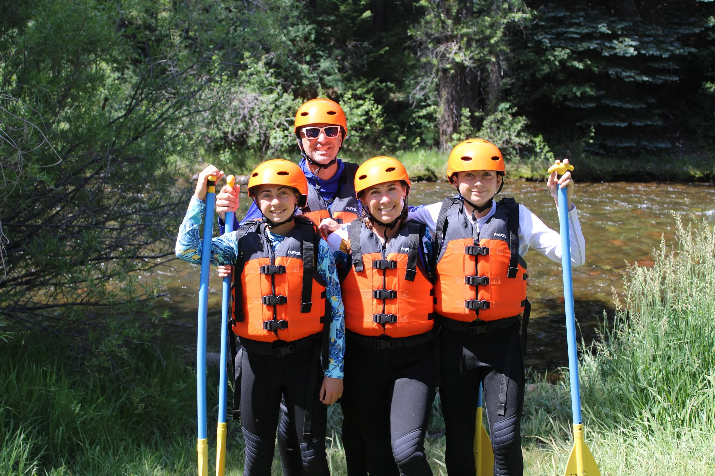 family ready for rafting