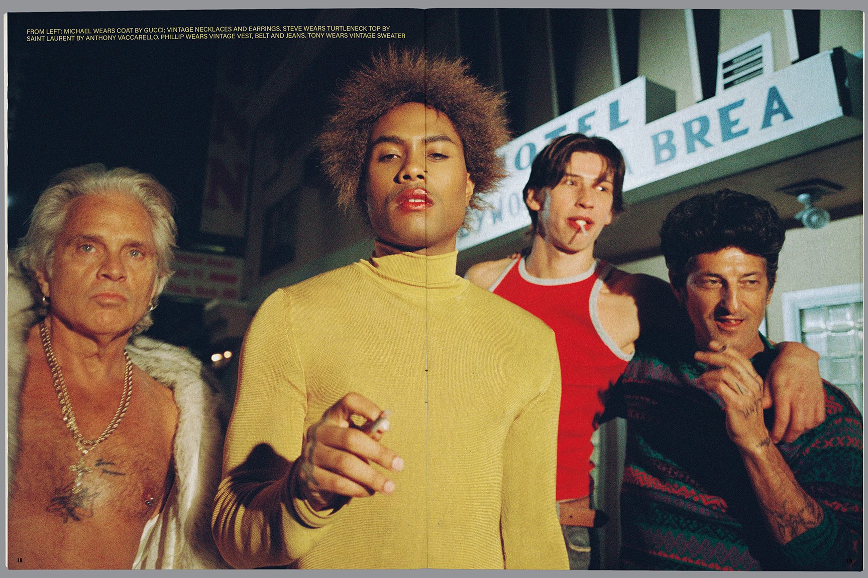 Four characters from the movie 'The Long Goodbye' standing in front of a motel with a sign that reads 'Otel No Bre'. The woman in the center wears a yellow turtleneck and holds a cigarette, with an afro hairstyle. To her left is an elderly man with s