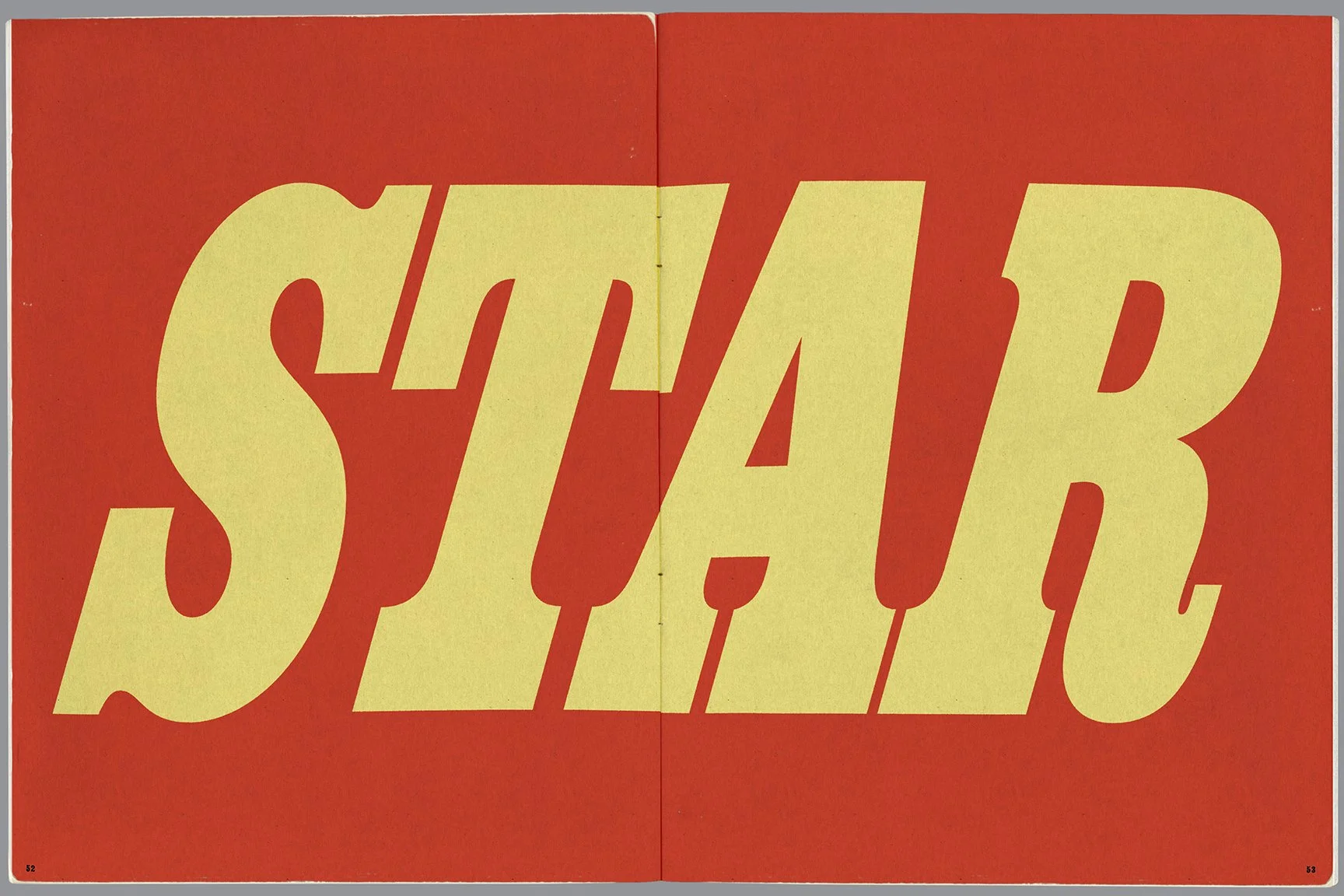 A large sign with yellow text that says "STOP" on a red background.