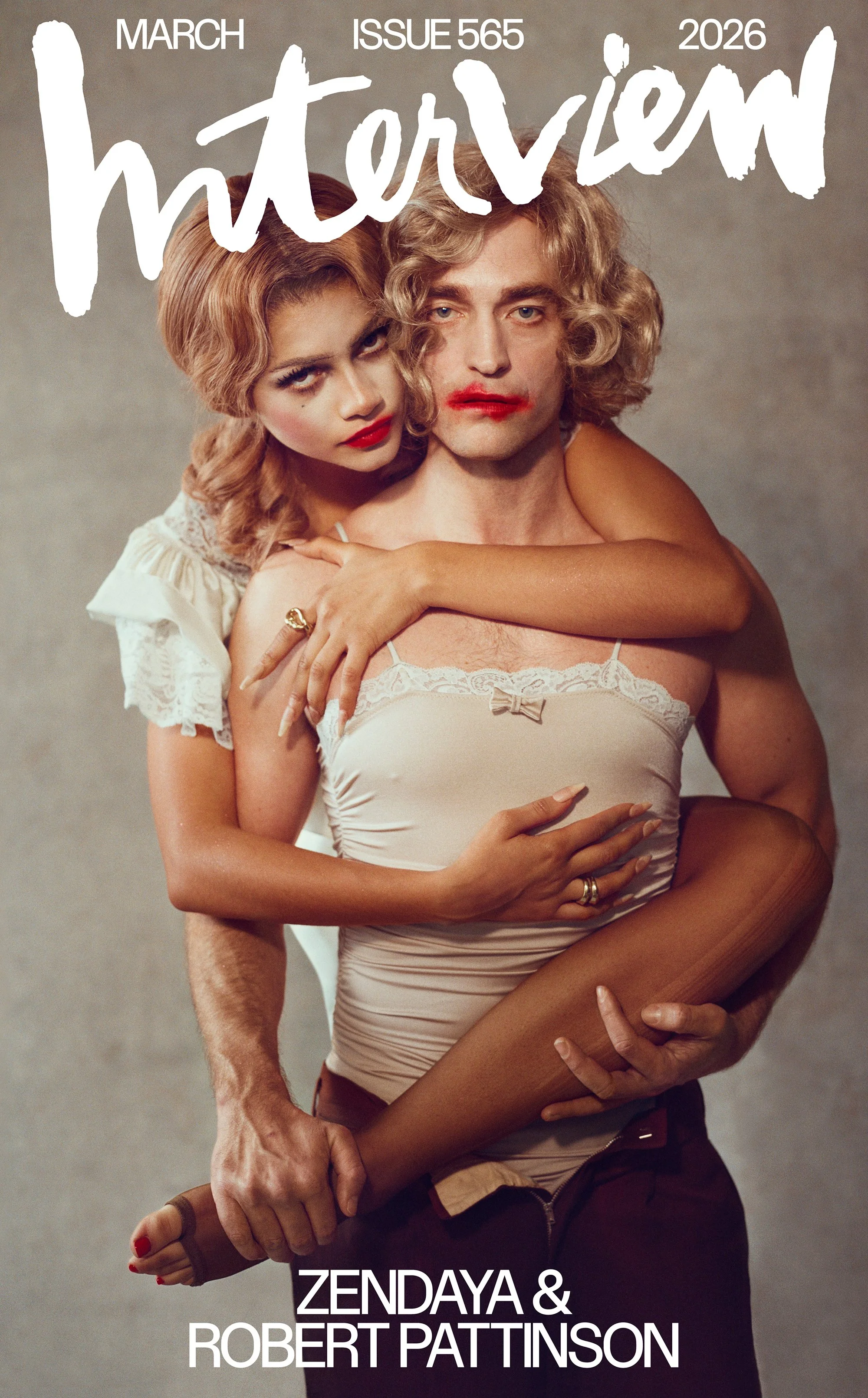 Cover of Interview magazine featuring Zendaya and Robert Pattinson in dramatic close-up pose, with Zendaya on Robert Pattinson's back, both with bold makeup and distinctive expressions, March 2026 issue.