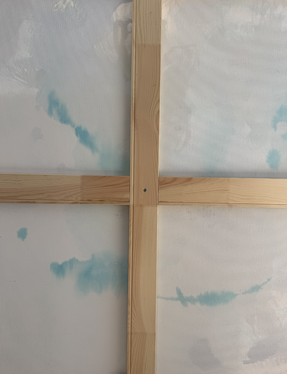 Back of a large canvas with pine cross brace and corner keys