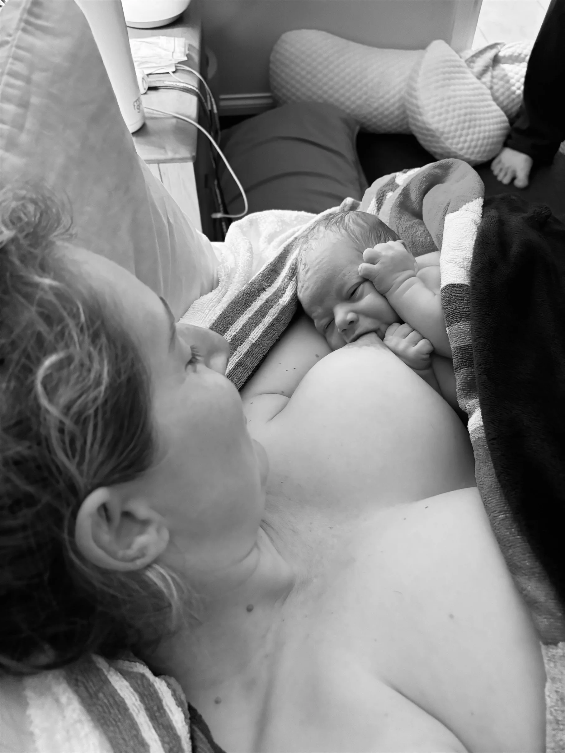 baby breastfeeding after empowering home birth