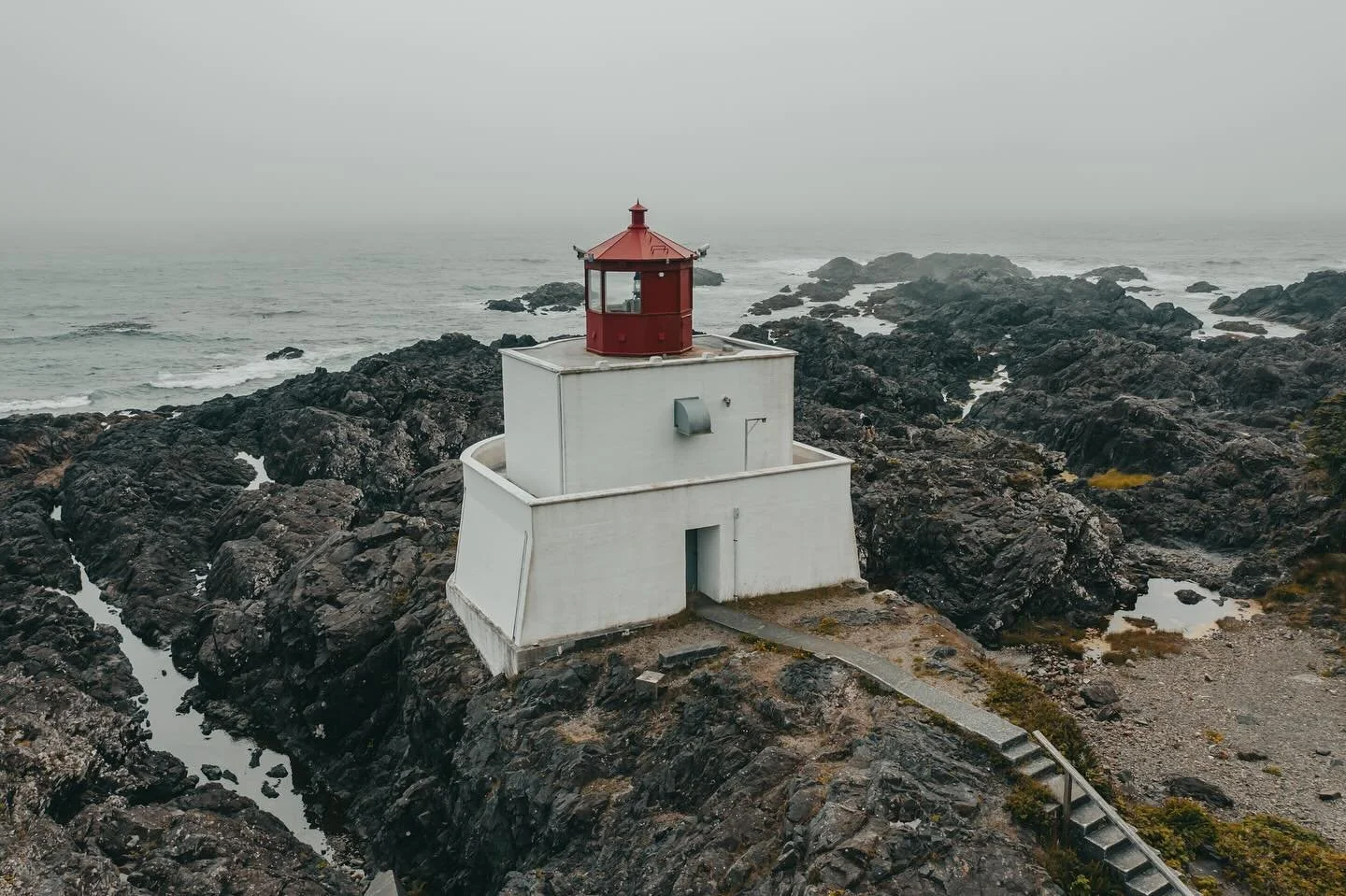 Amphitrite Lighthouse, Ucluelet BC

Sometimes you have to make the best you can with what you got and roll with the punches. 
When I set off for this photo, a moody, foggy scene isn&rsquo;t what I was expecting. It was beautiful and sunny everywhere 
